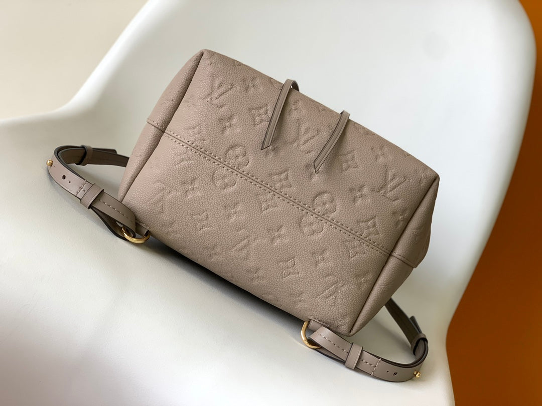 Louis Vuitton Elegant Taupe Embossed Leather Mini Backpack with Flap Closure