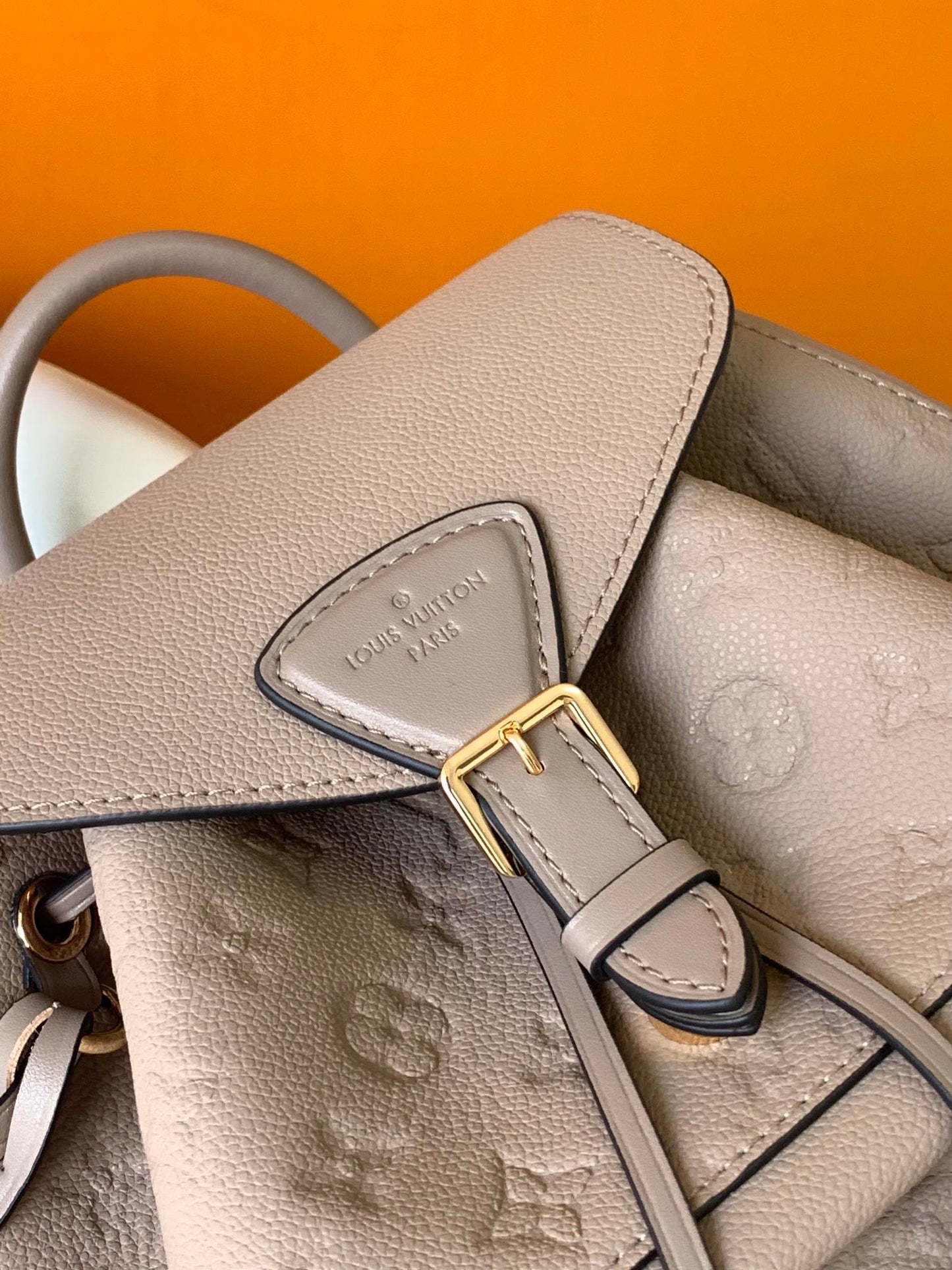 Louis Vuitton Elegant Taupe Embossed Leather Mini Backpack with Flap Closure