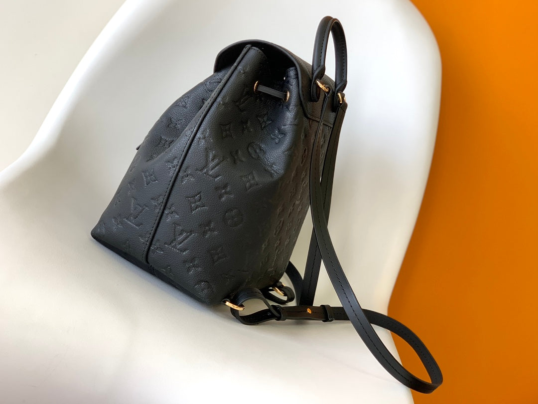 Louis Vuitton Elegant Black Embossed Leather Small Backpack with Flap Closure