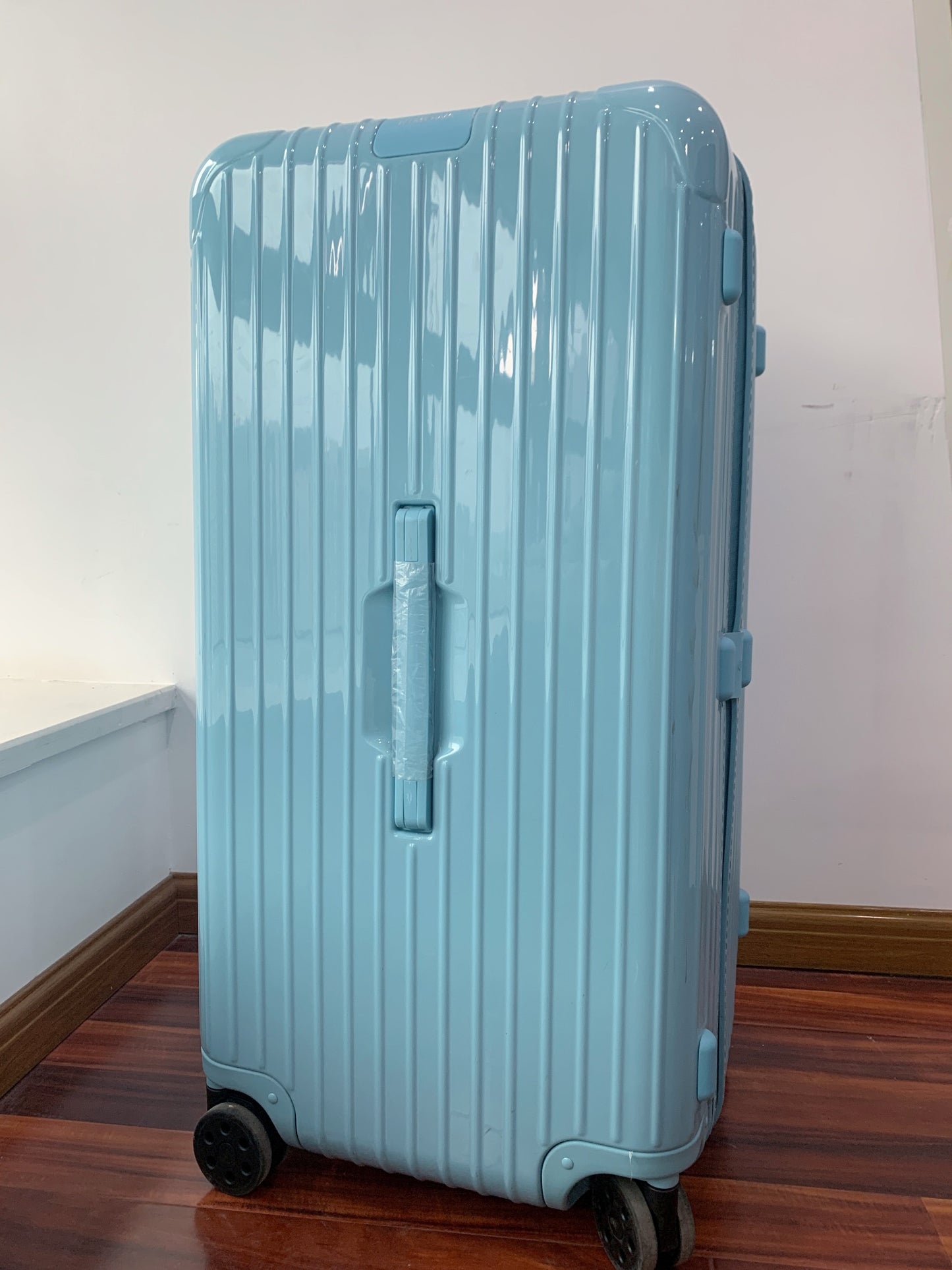 Light Blue Vertical Striped Hardside Spinner Trunk Suitcase