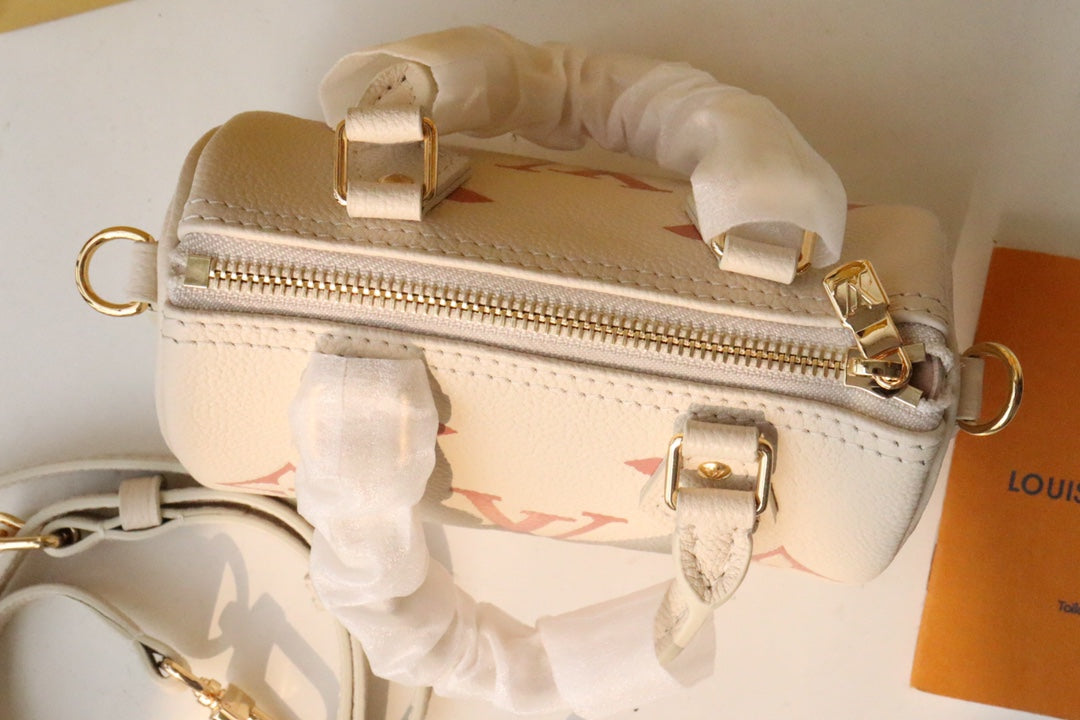Louis Vuitton Beige Leather Mini Top Handle Handbag with Pink Monogram