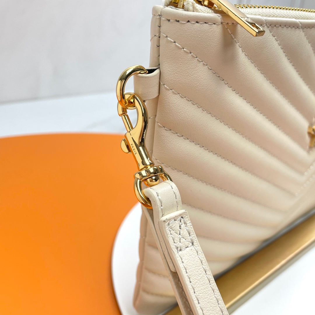 Saint Laurent Monogram Quilted Leather Pouch - Beige
