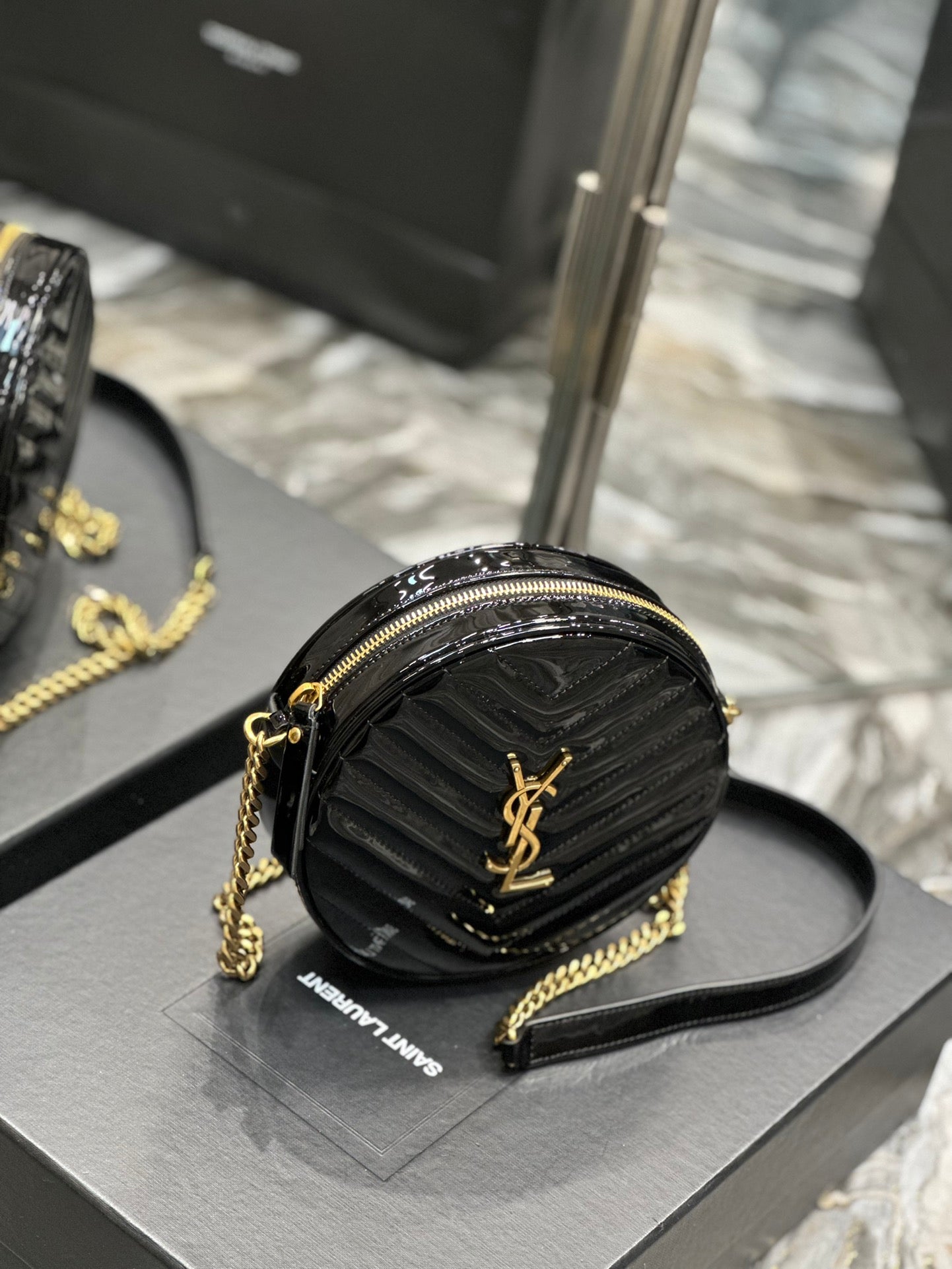 Saint Laurent Vinyle Round Camera Bag in Chevron-Quilted Leather - Black