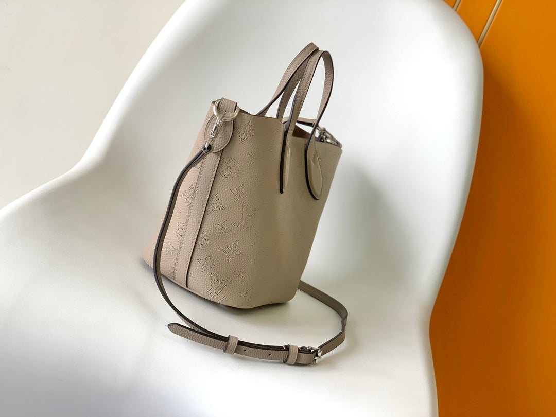 Louis Vuitton Elegant Taupe Perforated Leather Tote Handbag with Charm