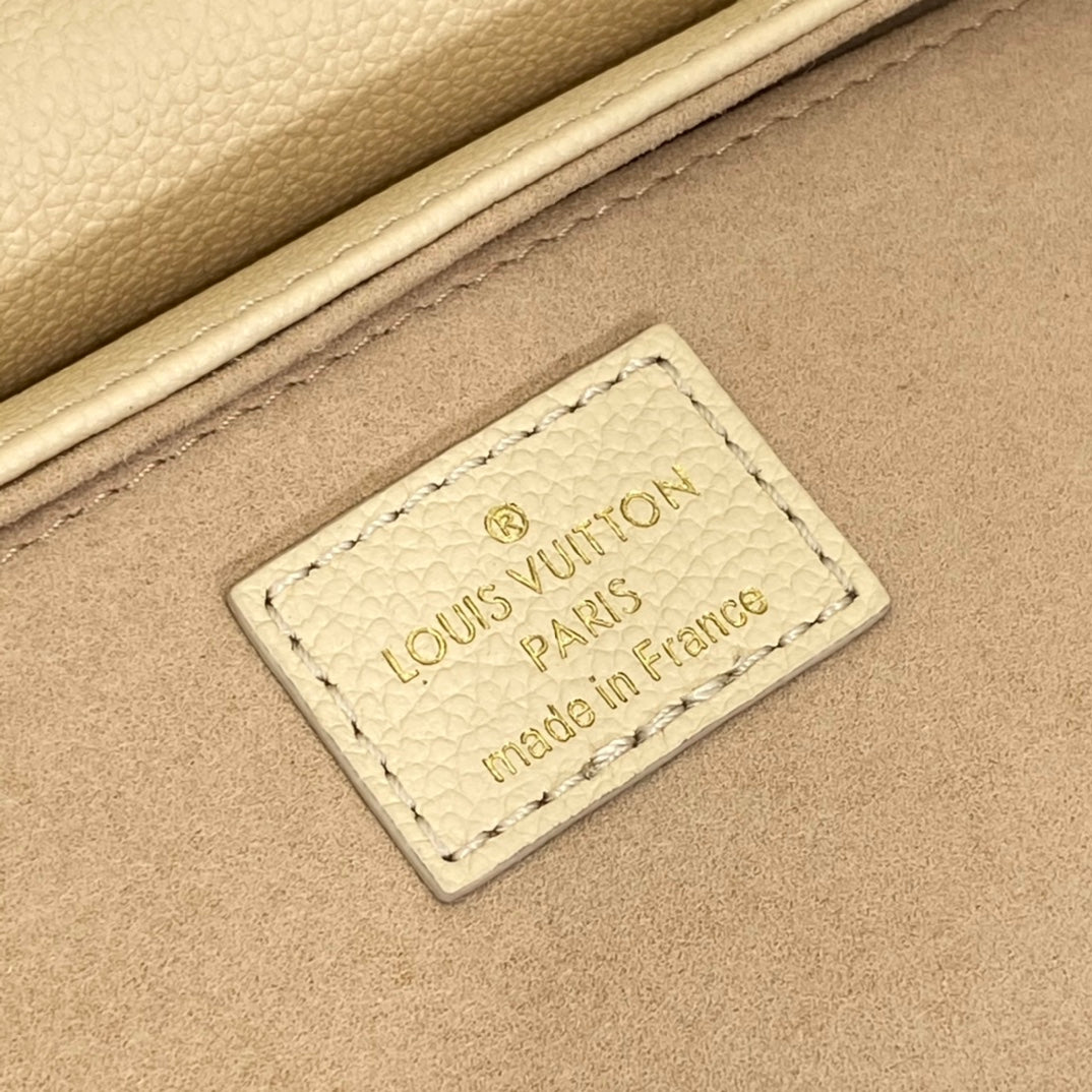 Louis Vuitton Elegant Beige Embossed Leather Shoulder Bag with Gold Chain
