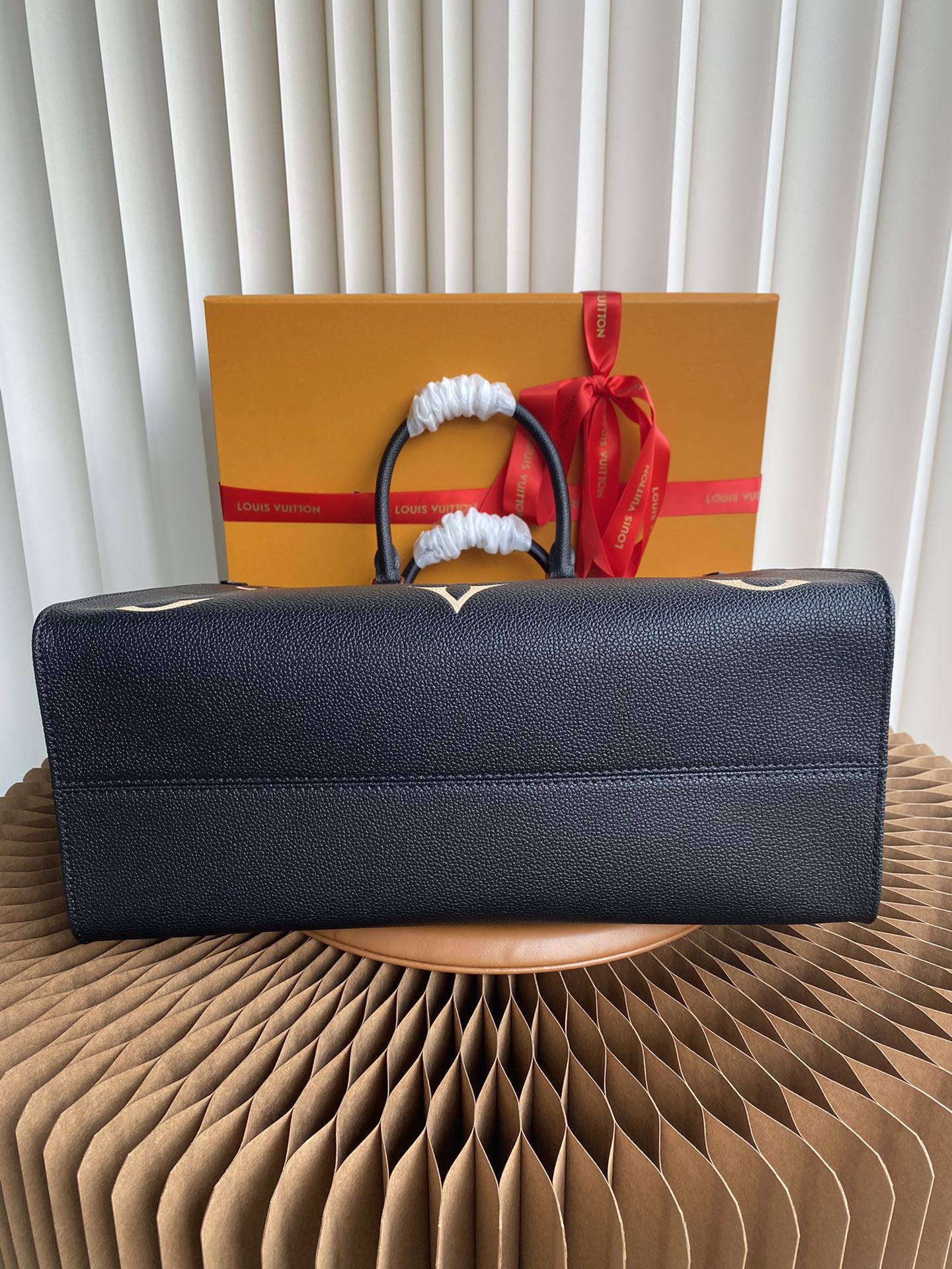 Louis Vuitton Luxury Black Leather Tote Bag with Gold Monogram Pattern