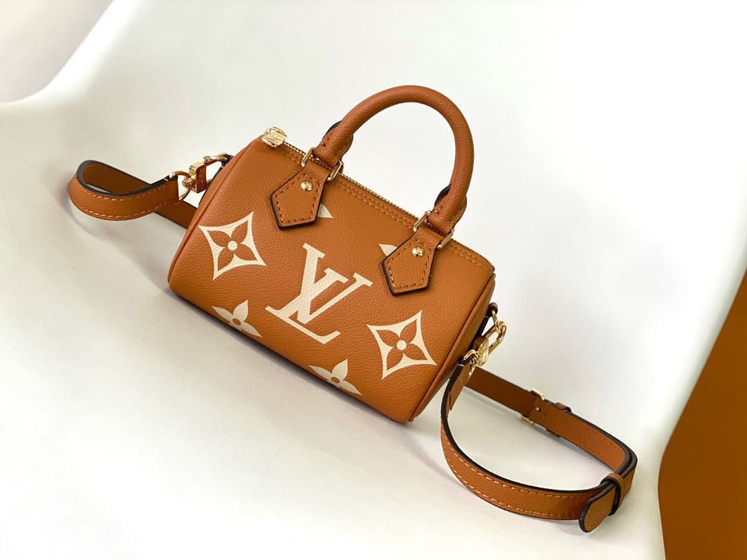 Louis Vuitton Classic Tan Monogram Mini Duffle Handbag with Adjustable Shoulder Strap