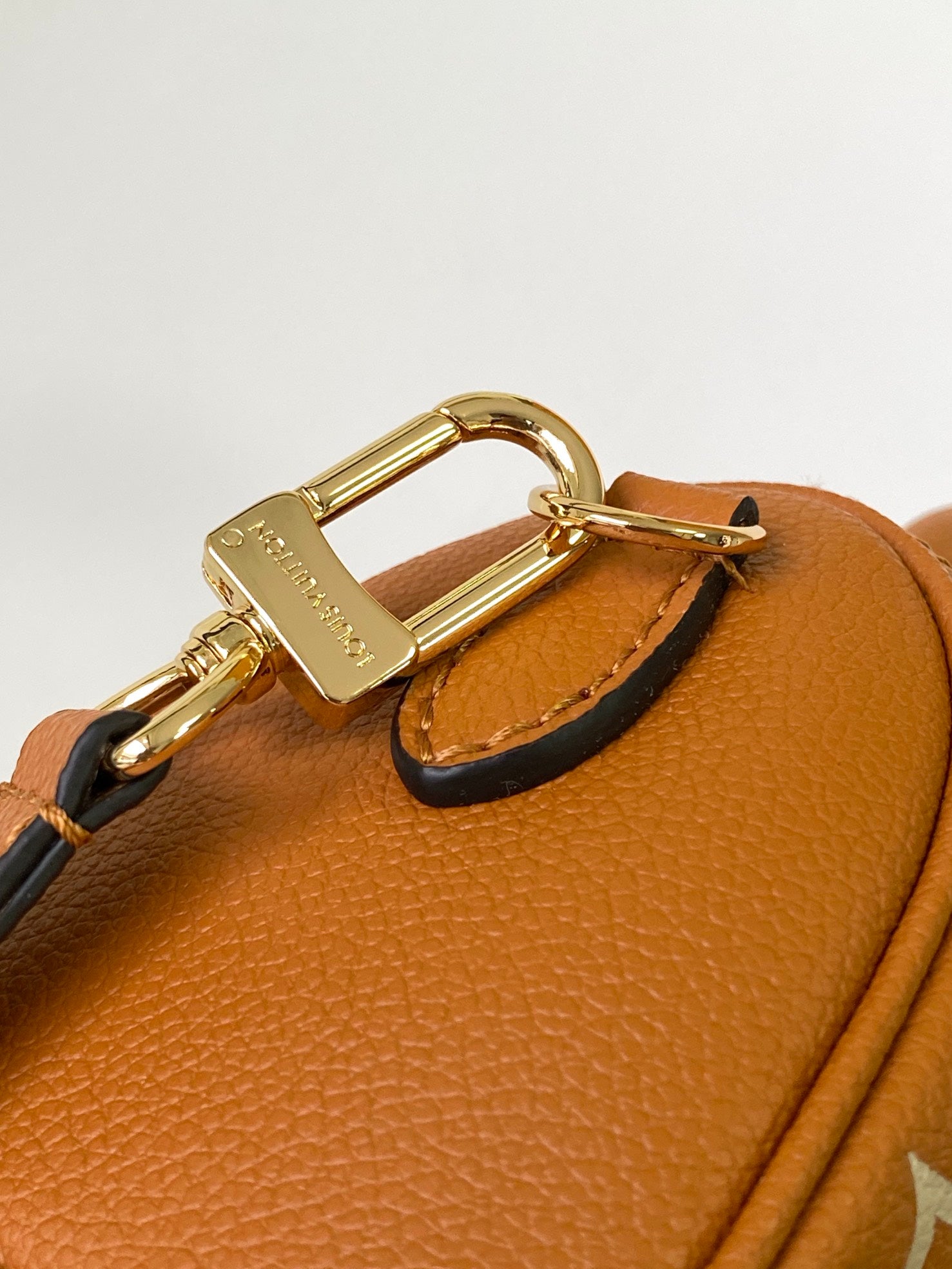 Louis Vuitton Classic Tan Monogram Mini Duffle Handbag with Adjustable Shoulder Strap