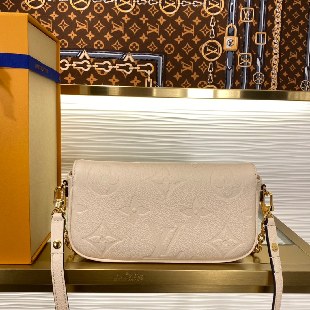 Louis Vuitton Lexington Pouch Monogram Empreinte Leather - Cream
