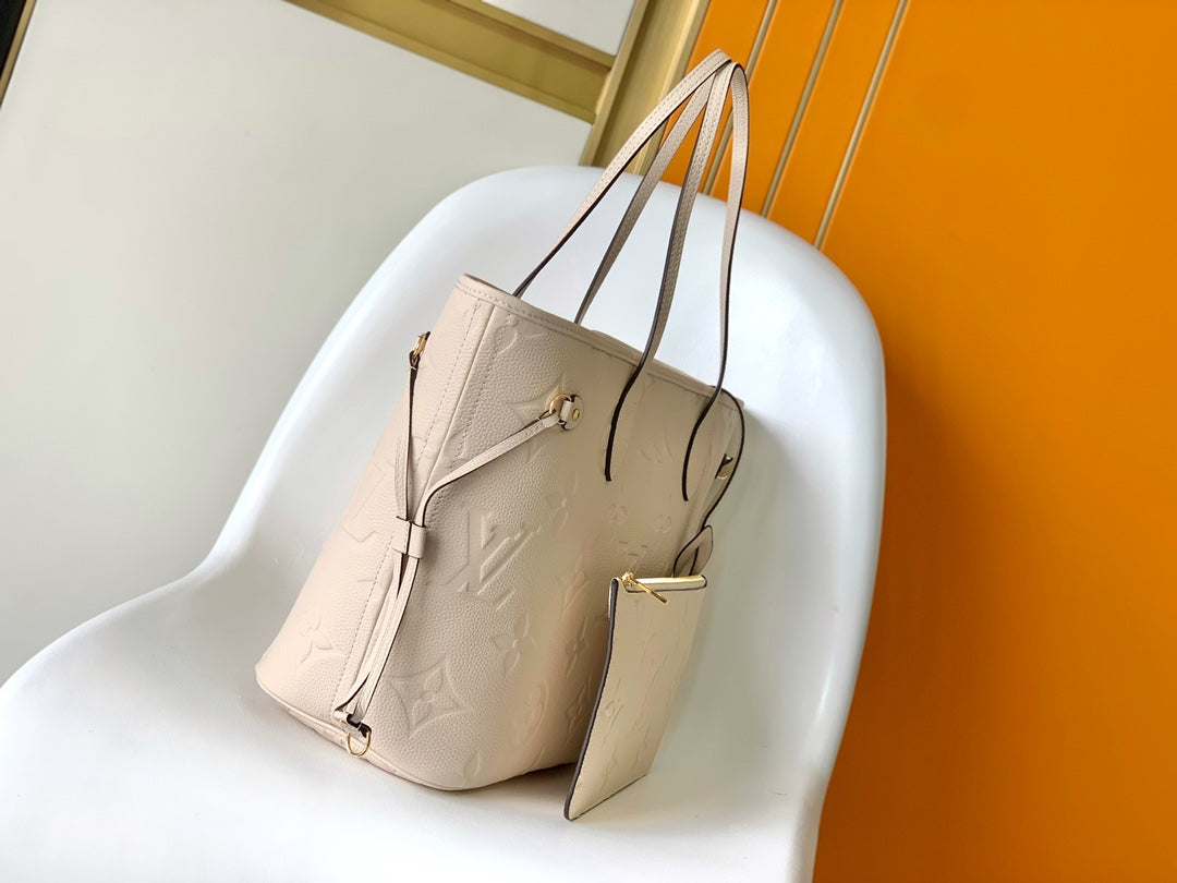Louis Vuitton Elegant Beige Embossed Leather Tote Bag with Side Drawstrings