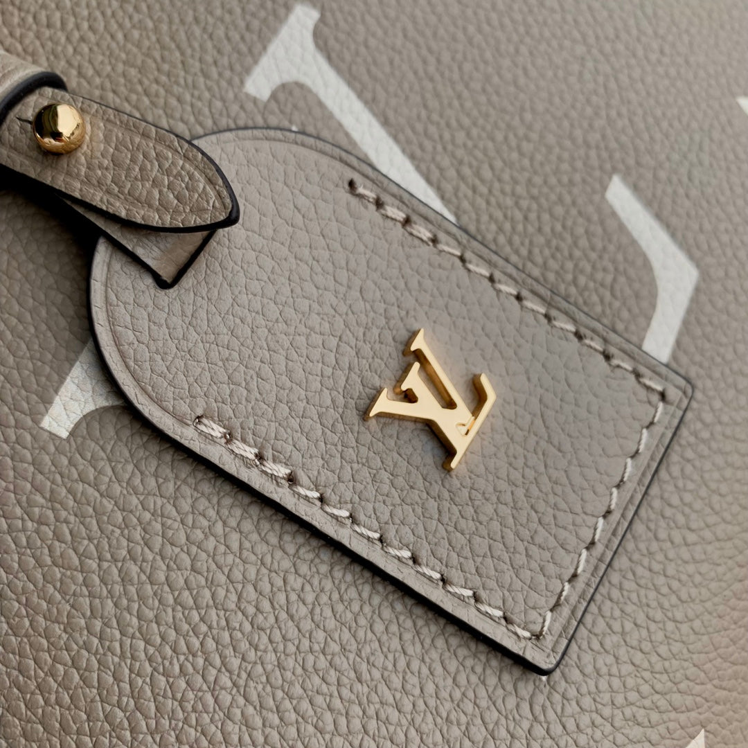 Louis Vuitton Elegant Beige Monogram Pattern Leather Handbag with Top Handle