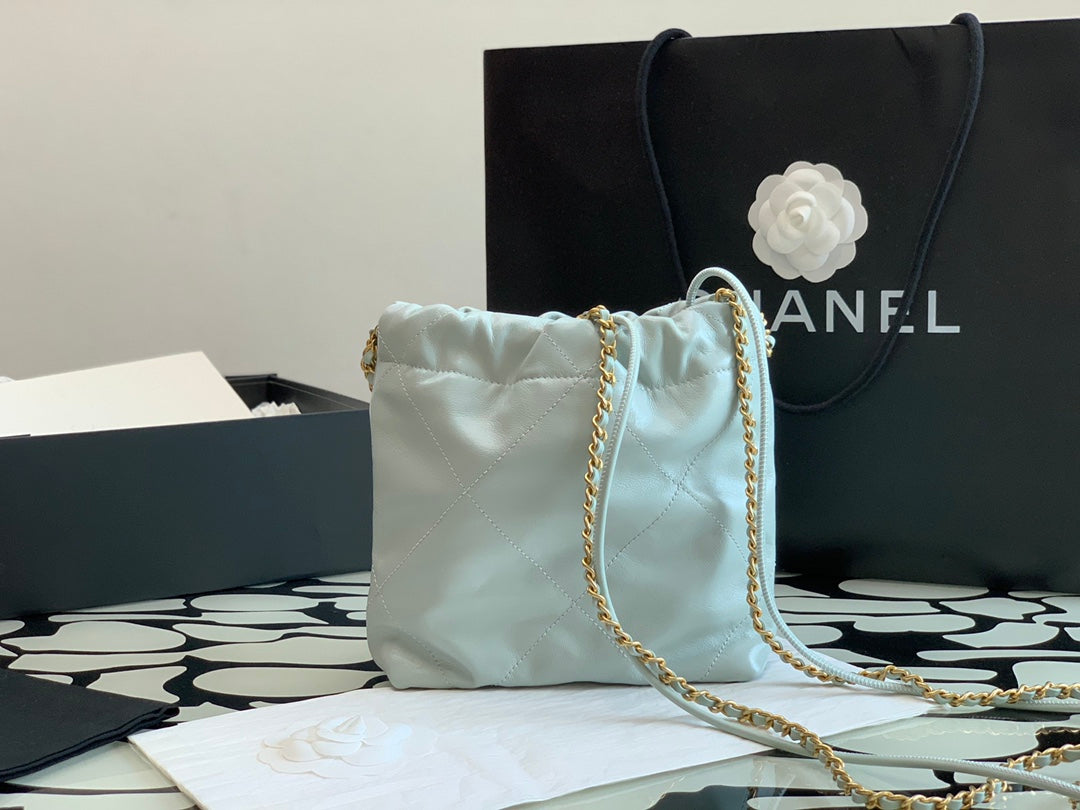 Chanel Mini Drawstring Pouch Bag with Gold-Tone Chain and Coin Charm - Mint Green