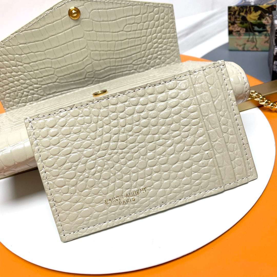 Saint Laurent Cassandre Chain Wallet in Crocodile-Embossed Leather - Cream