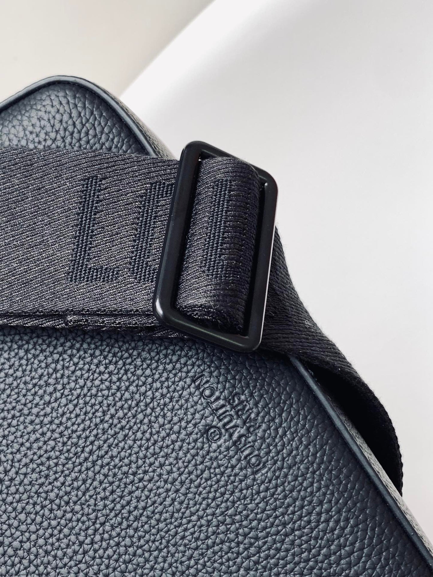Louis Vuitton Minimalist Black Leather Crossbody Bag with Wide Adjustable Strap