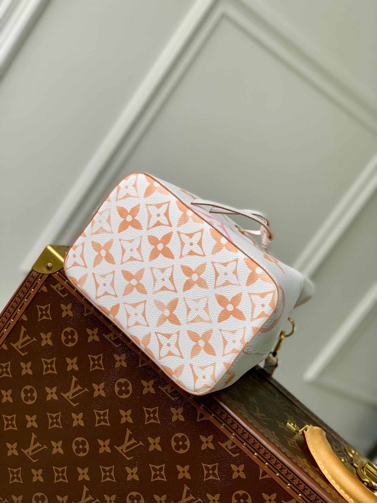 Louis Vuitton White Leather Drawstring Bucket Bag with Pastel Geometric Print