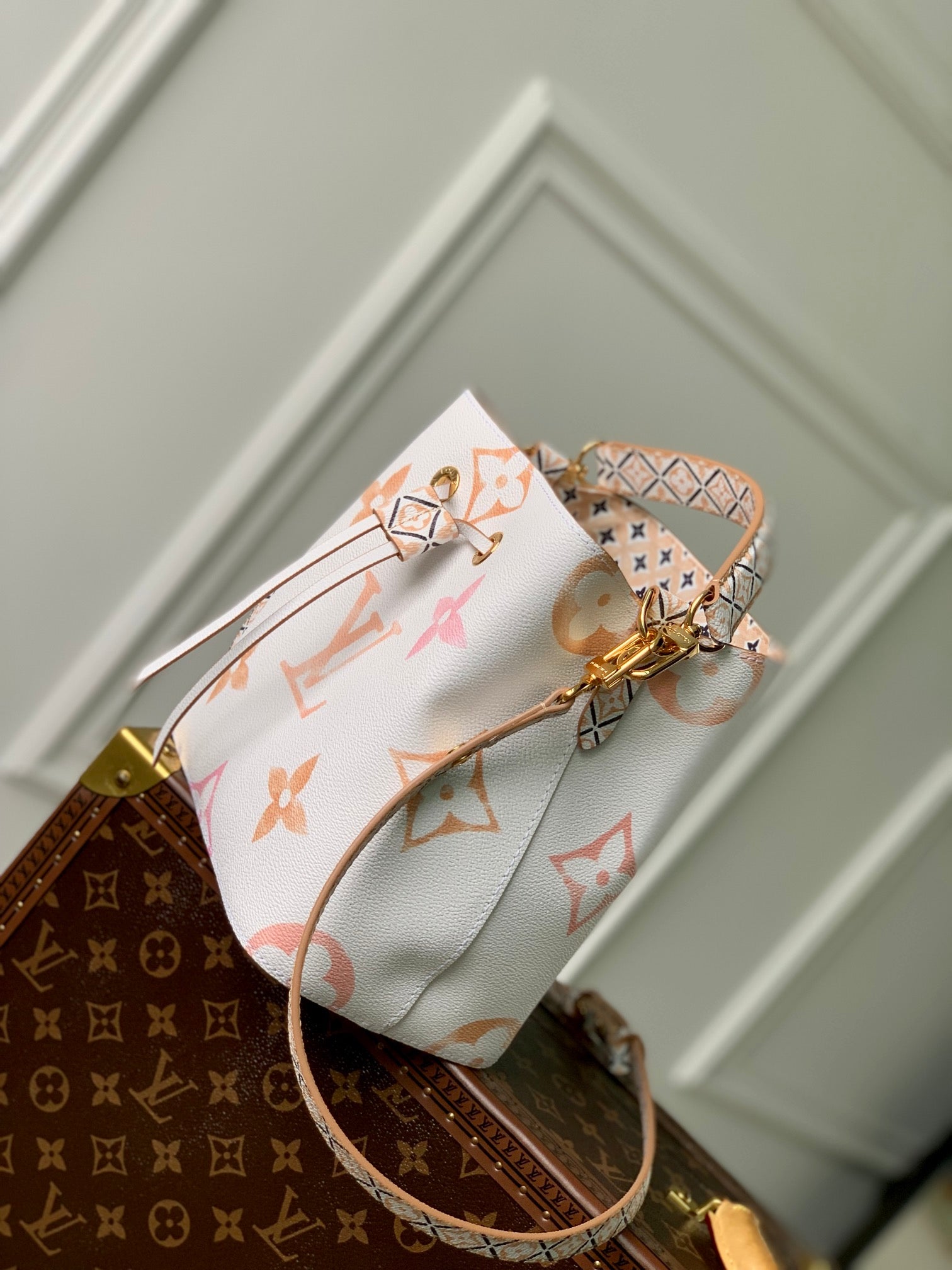 Louis Vuitton White Leather Drawstring Bucket Bag with Pastel Geometric Print
