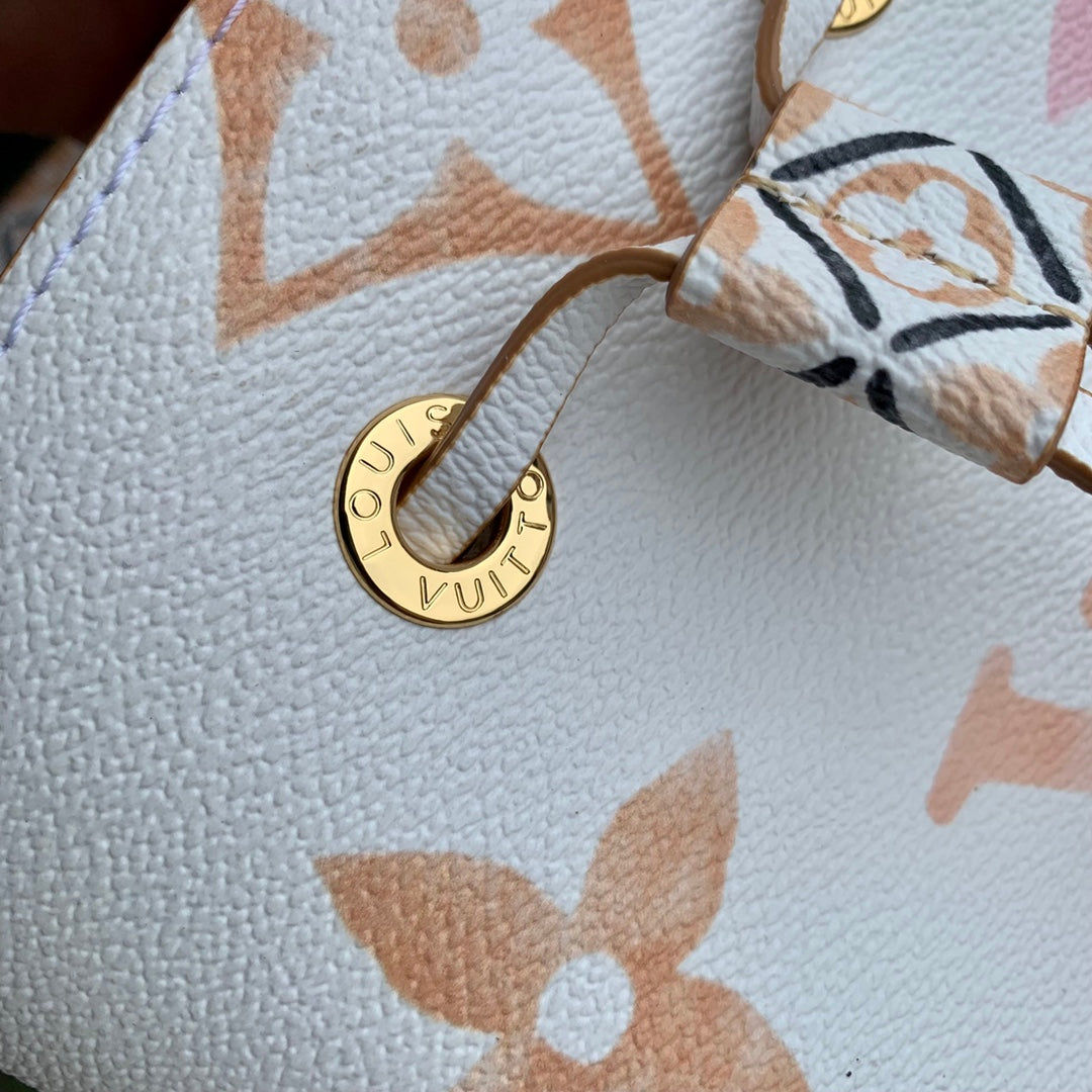 Louis Vuitton White Leather Drawstring Bucket Bag with Pastel Geometric Print