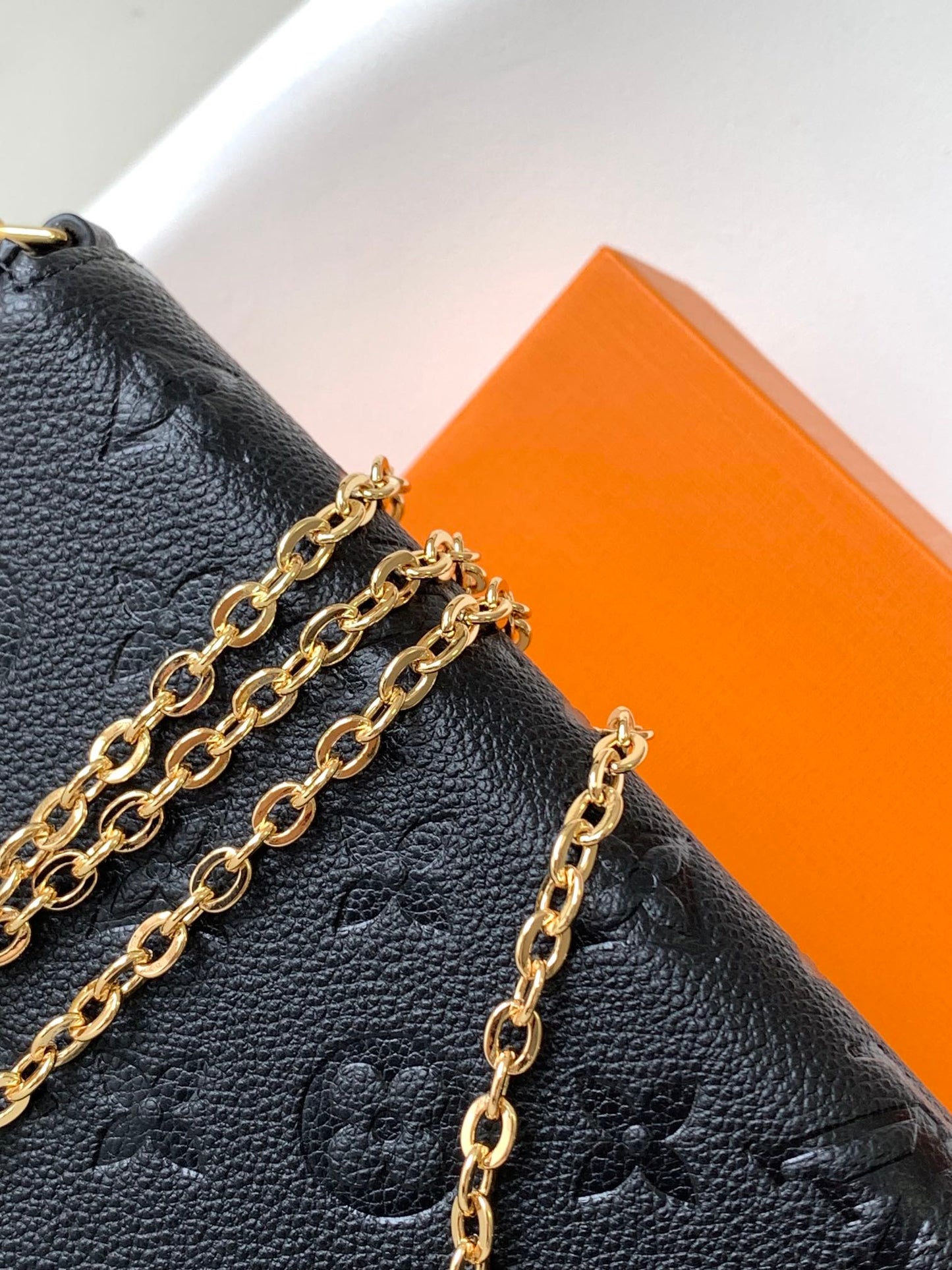 Louis Vuitton Black Monogram Embossed Leather Crossbody Clutch Bag with Gold Chain