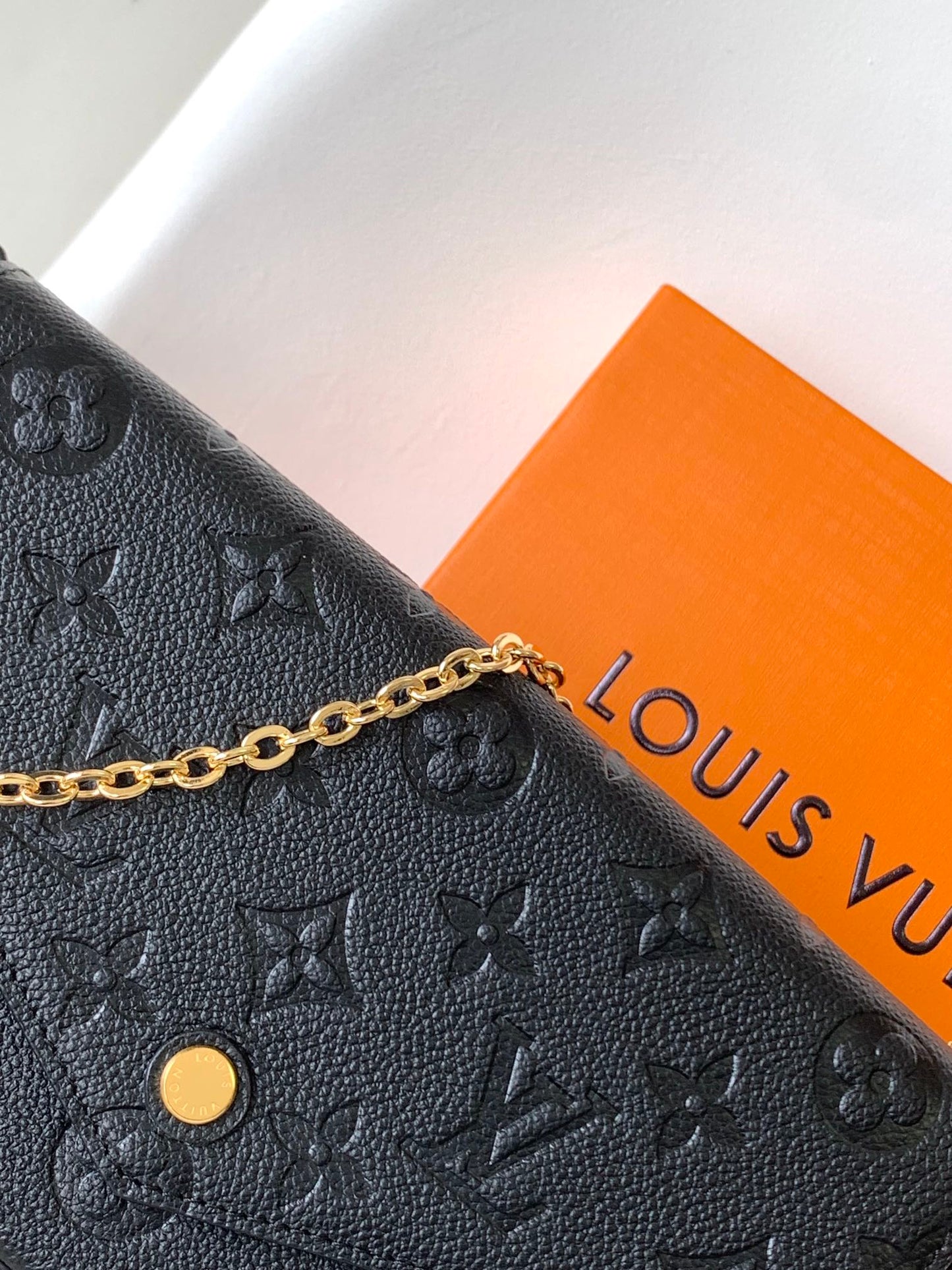 Louis Vuitton Black Monogram Embossed Leather Crossbody Clutch Bag with Gold Chain