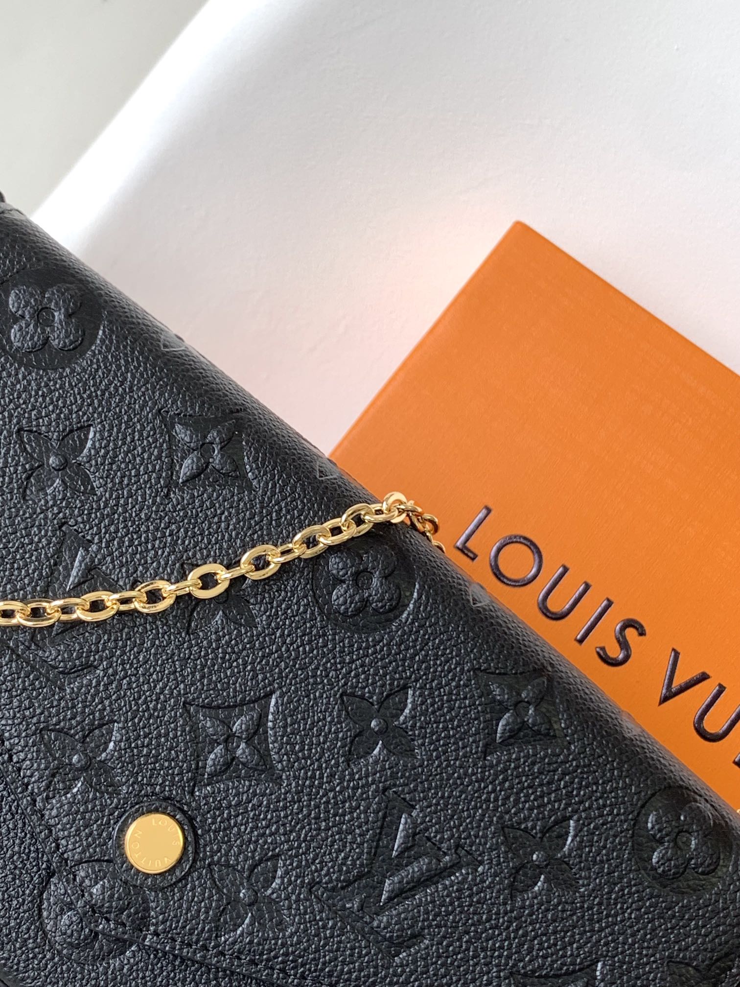 Louis Vuitton Black Monogram Embossed Leather Crossbody Clutch Bag with Gold Chain