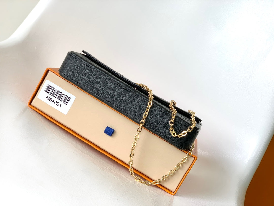 Louis Vuitton Black Monogram Embossed Leather Crossbody Clutch Bag with Gold Chain