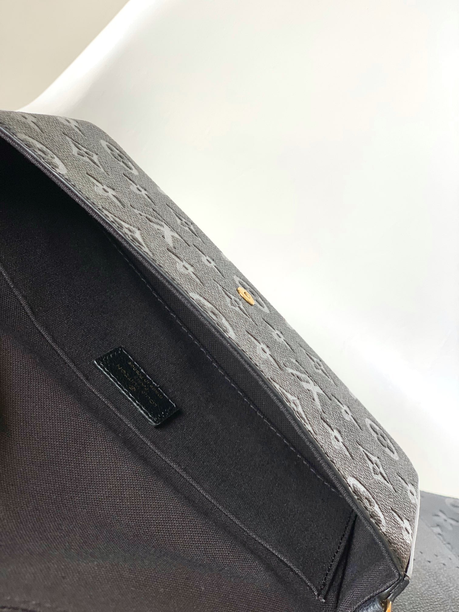 Louis Vuitton Black Monogram Embossed Leather Crossbody Clutch Bag with Gold Chain