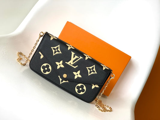 Louis Vuitton Elegant Black Chain Shoulder Bag with Gold Monogram Print