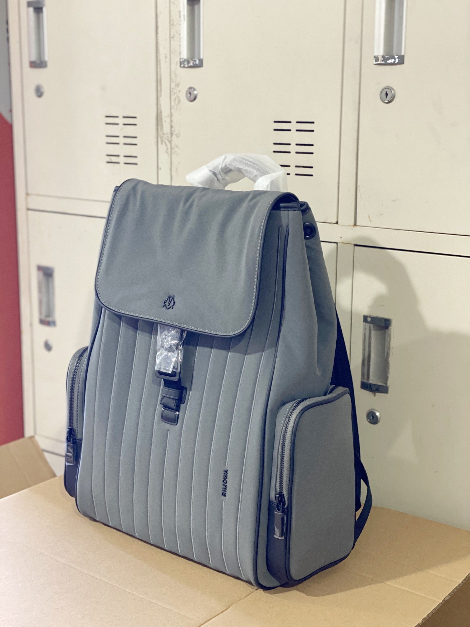 Grey Minimalist Flap Backpack with Ribbed Front Panel and Buckle