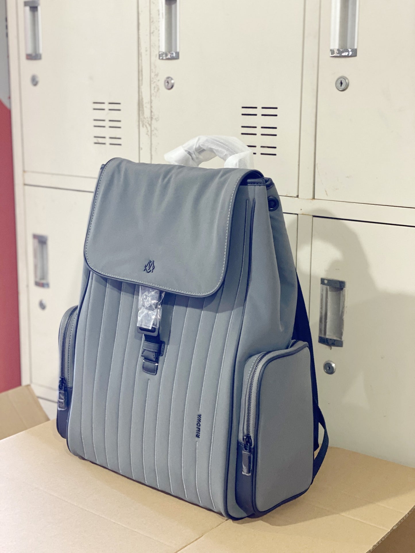 Grey Minimalist Flap Backpack with Ribbed Front Panel and Buckle