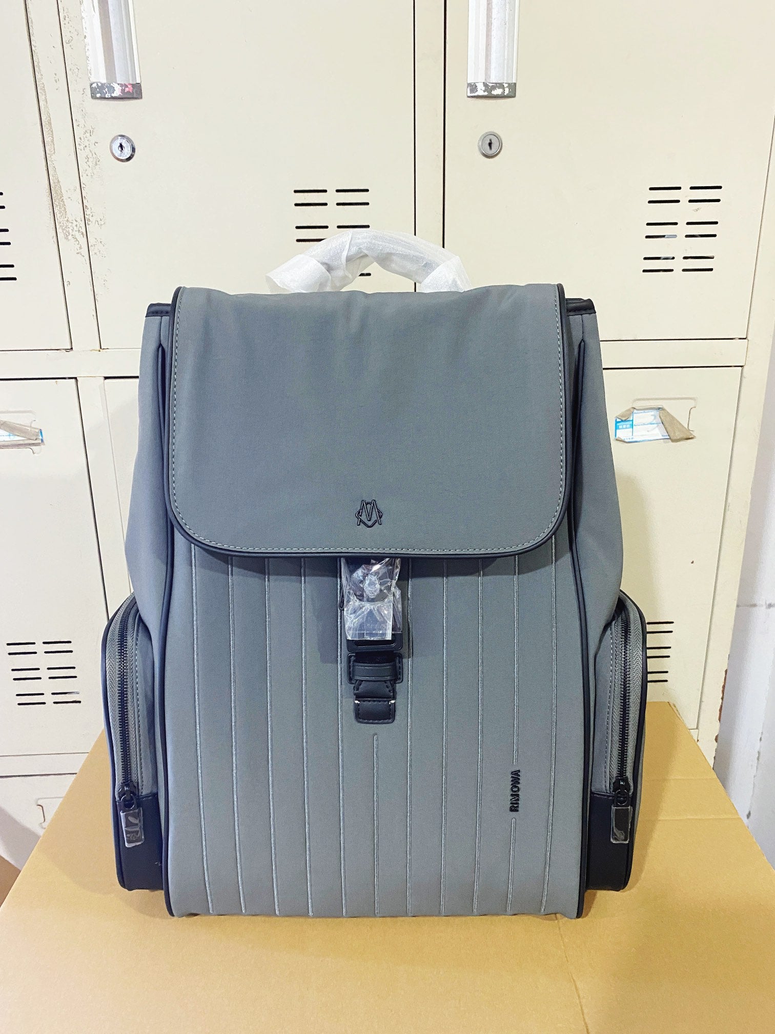 Grey Minimalist Flap Backpack with Ribbed Front Panel and Buckle