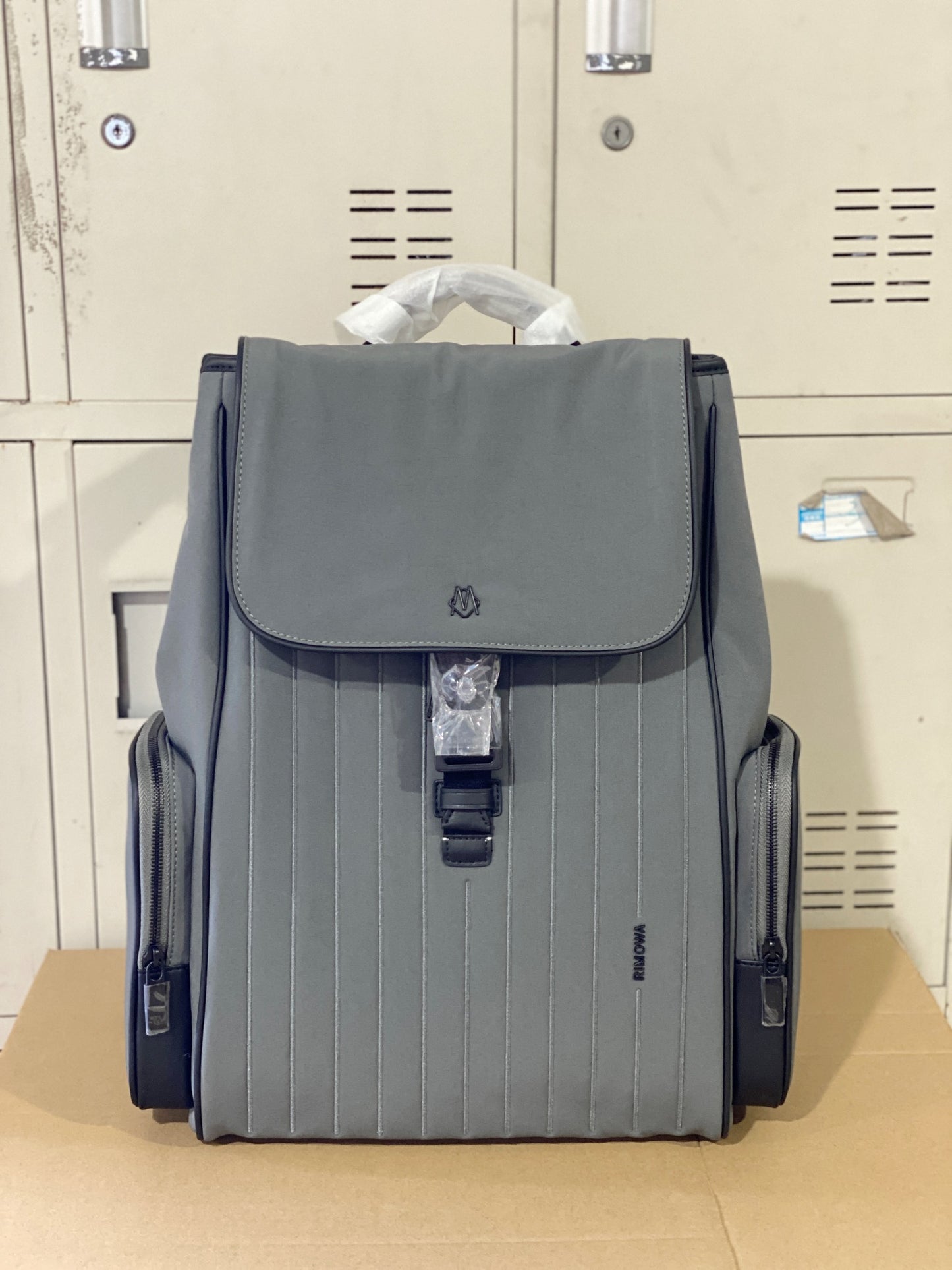 Grey Minimalist Flap Backpack with Ribbed Front Panel and Buckle