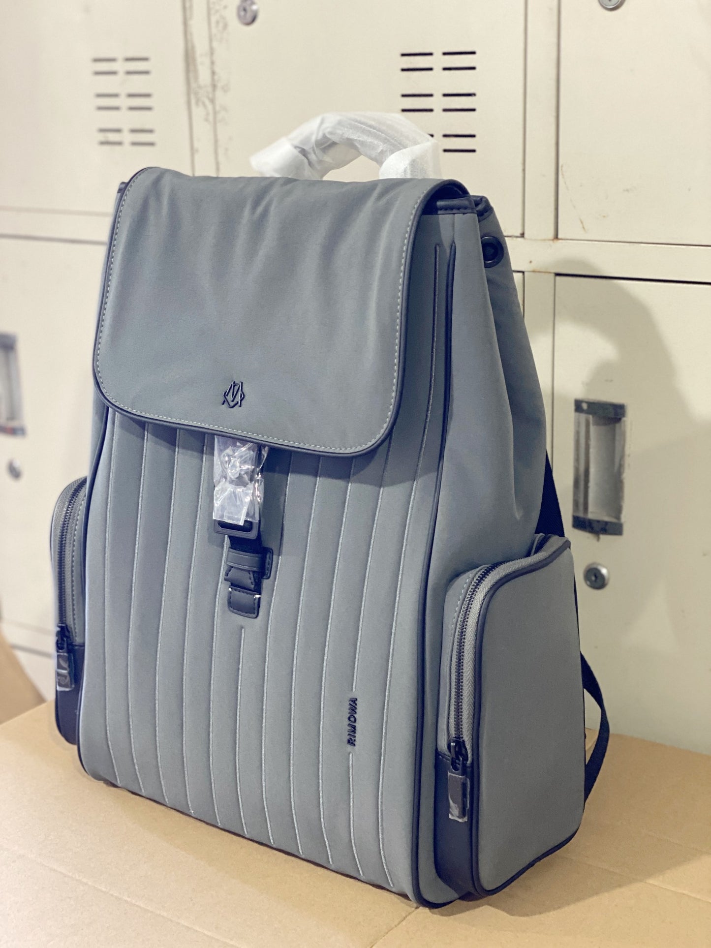Grey Minimalist Flap Backpack with Ribbed Front Panel and Buckle