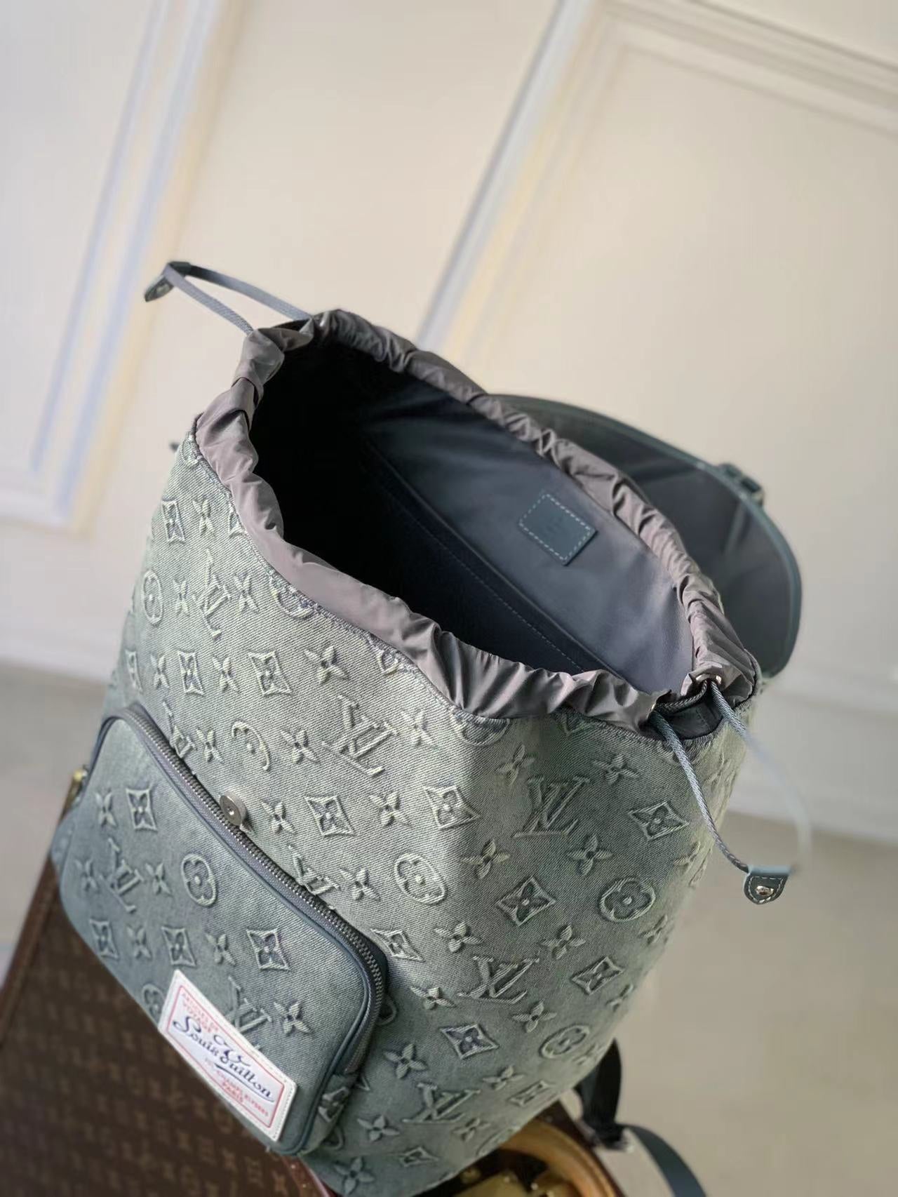 Louis Vuitton Light Grey Embossed Monogram Leather Backpack with Buckle Flap