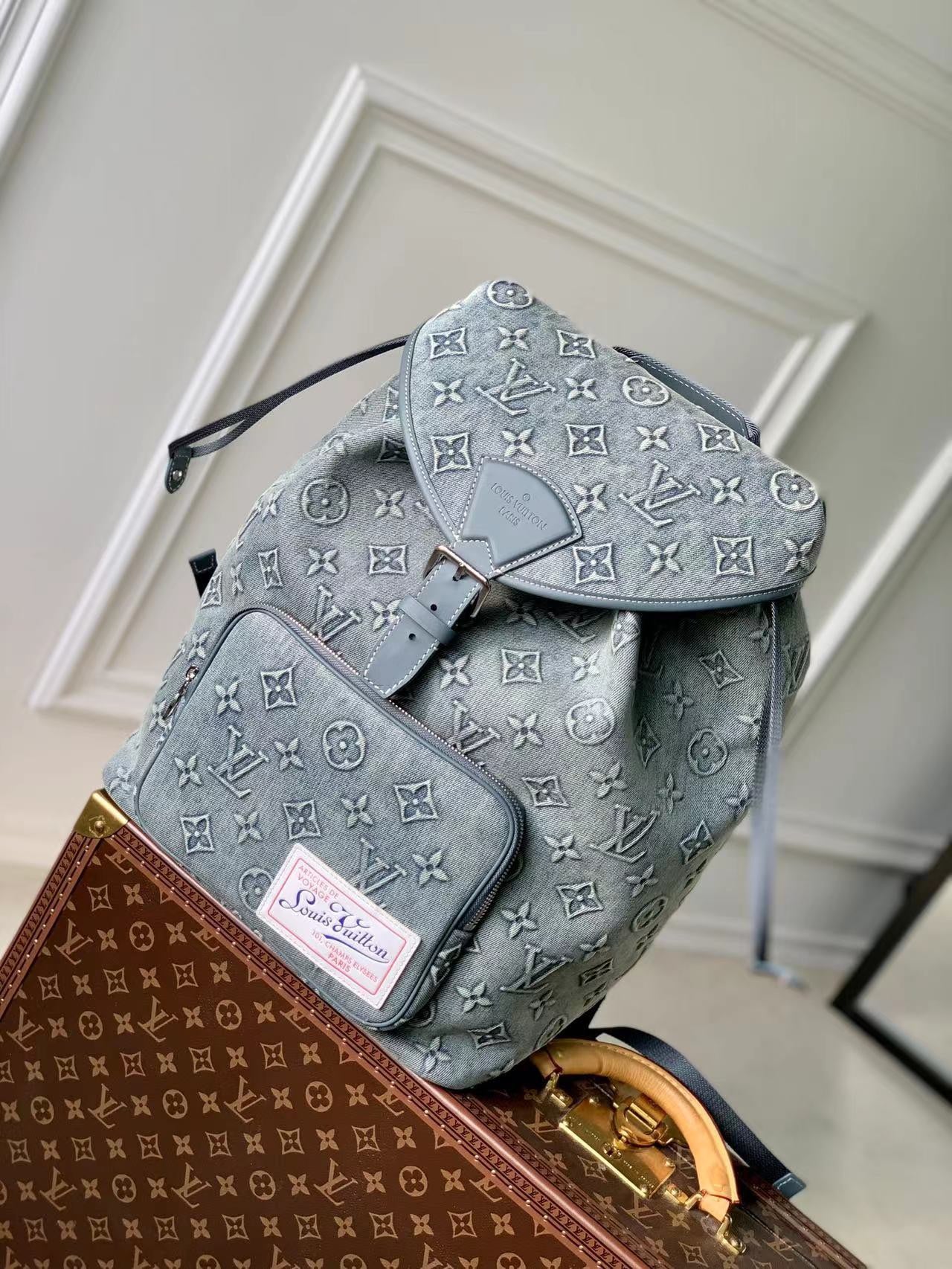Louis Vuitton Light Grey Embossed Monogram Leather Backpack with Buckle Flap