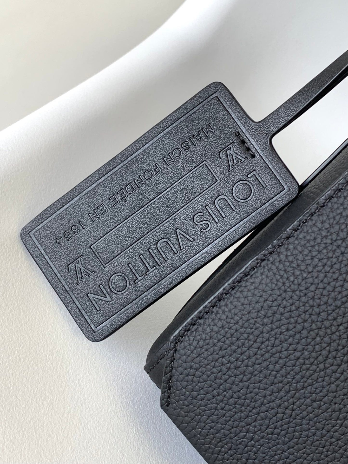 Louis Vuitton Minimalist Black Leather Messenger Bag with Wide Crossbody Strap