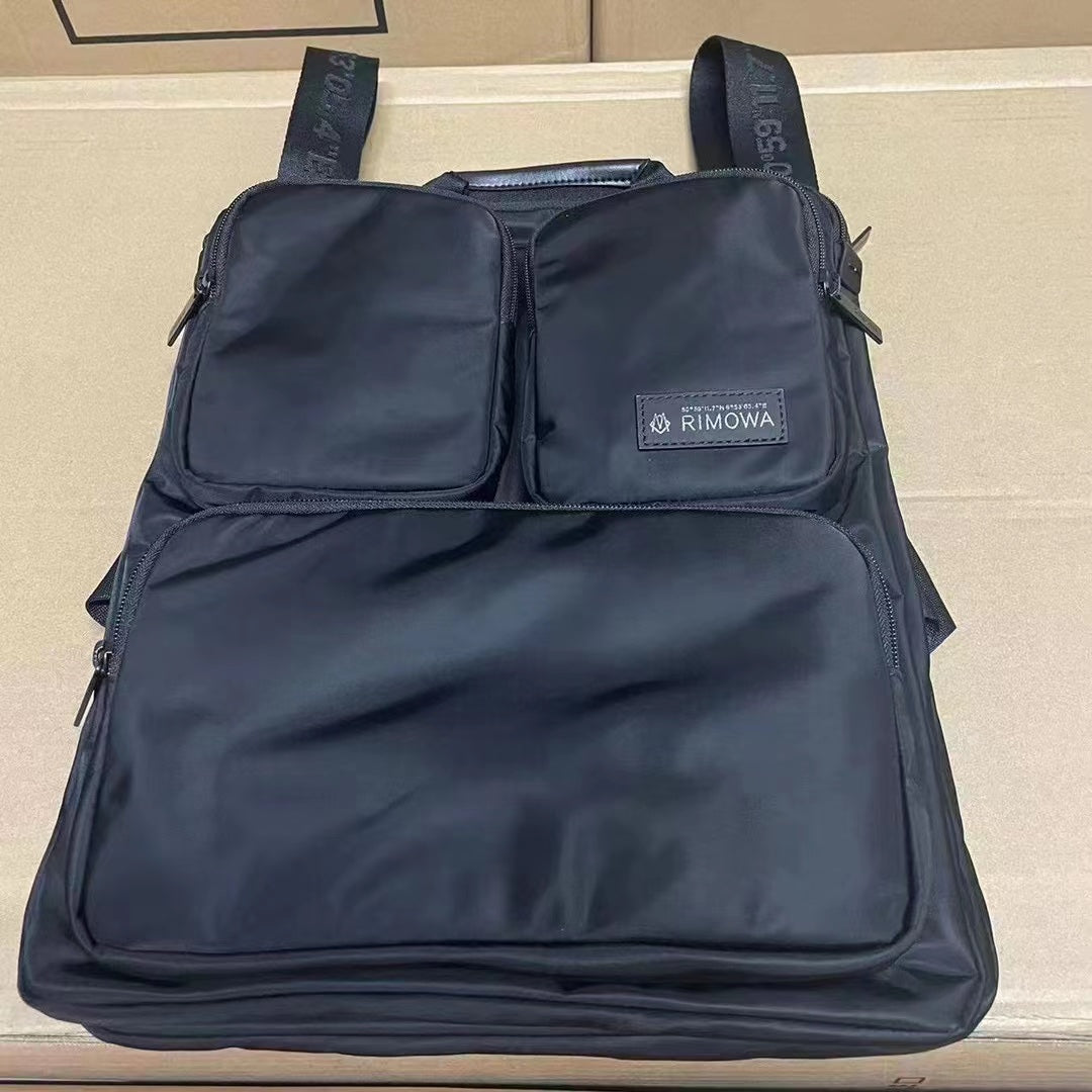 Minimalist Black Multi-Compartment Nylon Travel Backpack