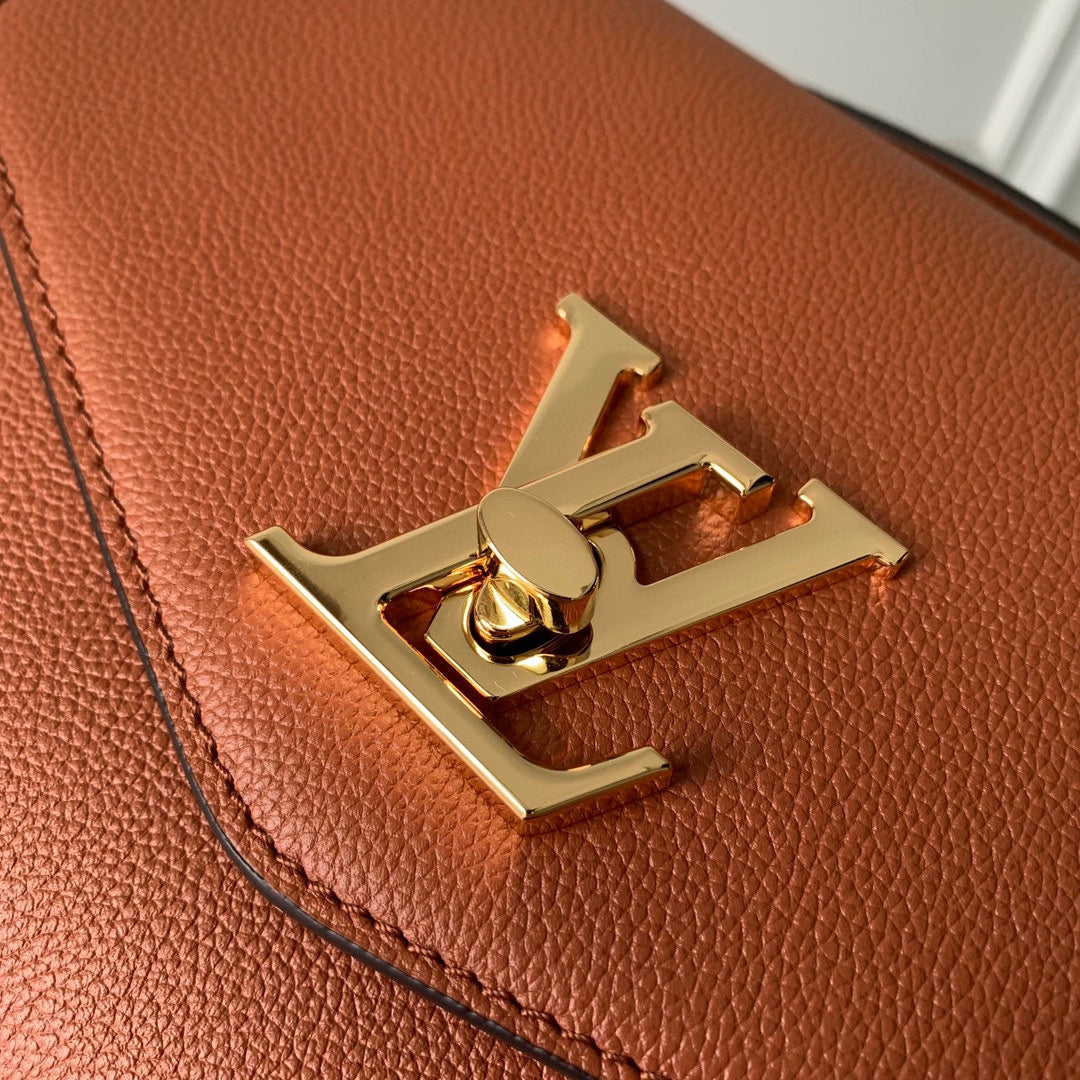 Louis Vuitton Elegant Brown Leather Shoulder Crossbody Bag with Gold Chain