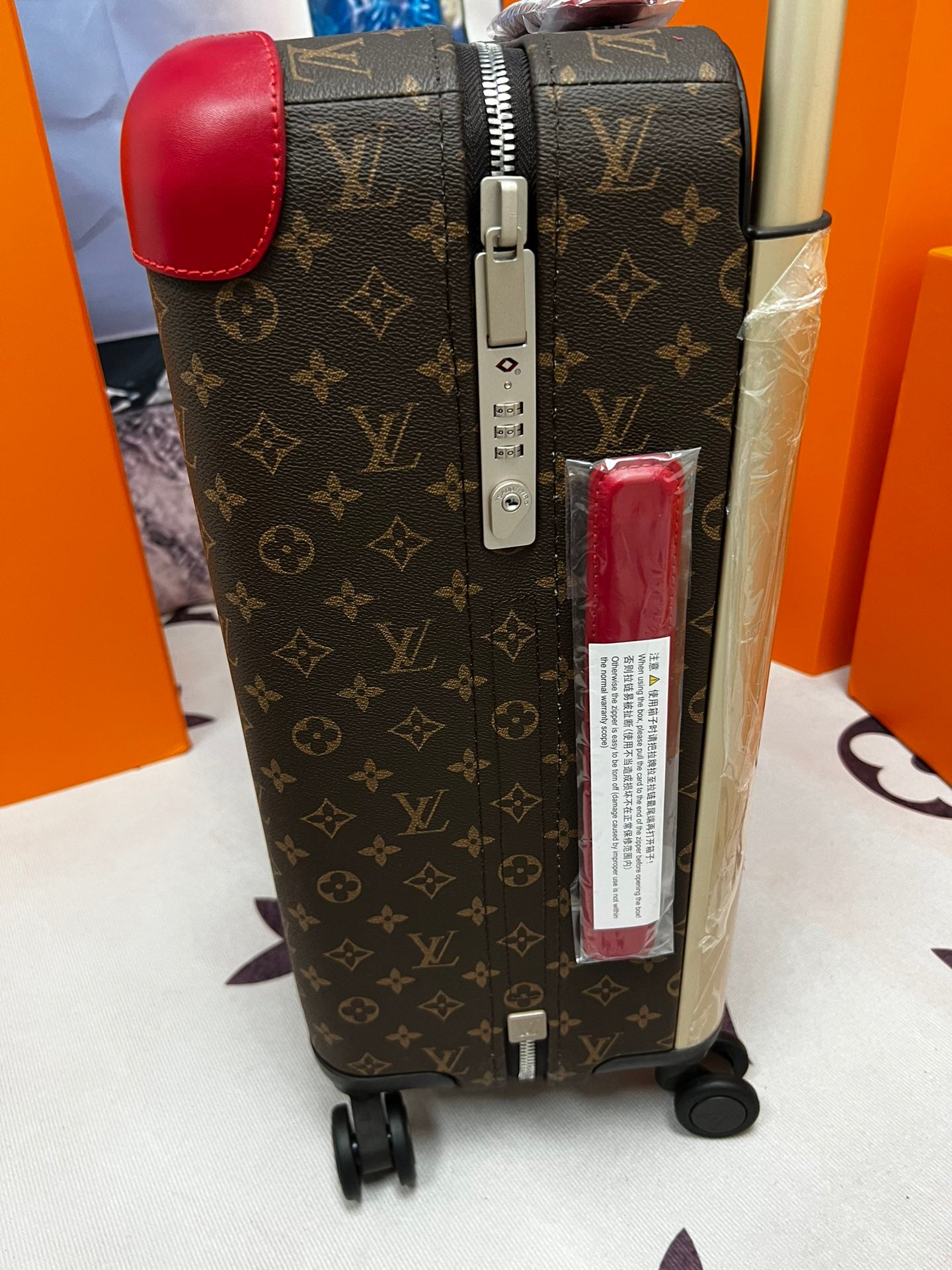 Luxury Monogram Print Rolling Suitcase with Red Trim