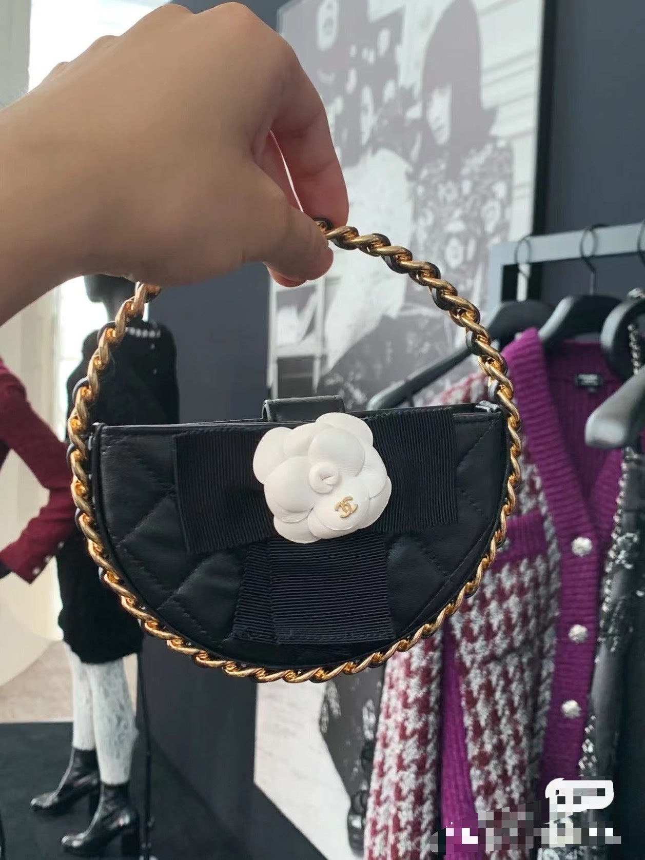 Chanel Small Round Camellia Handbag - Quilted Black Lambskin