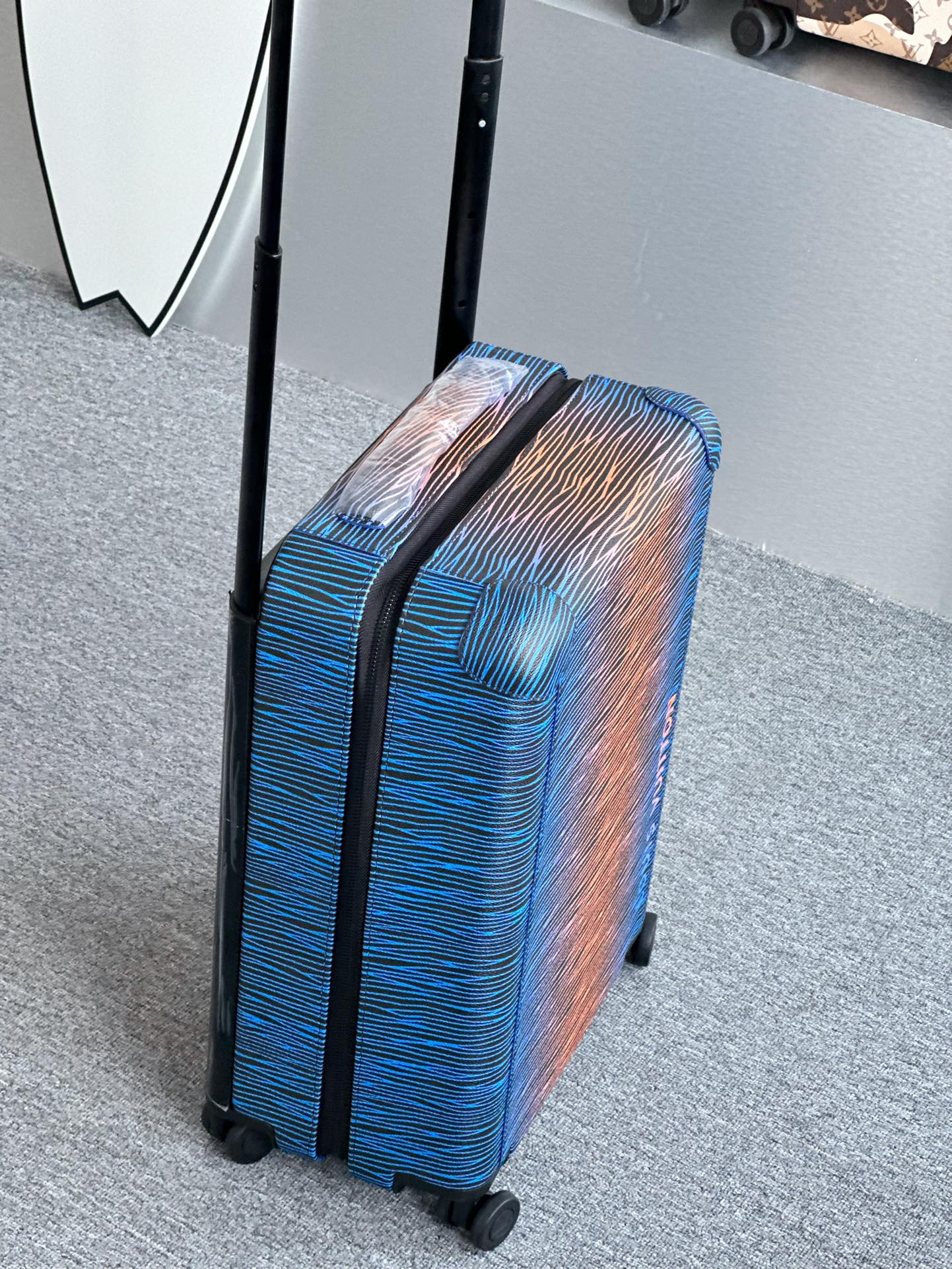 Gradient Blue and Orange Textured Hardshell Carry-On Spinner Luggage
