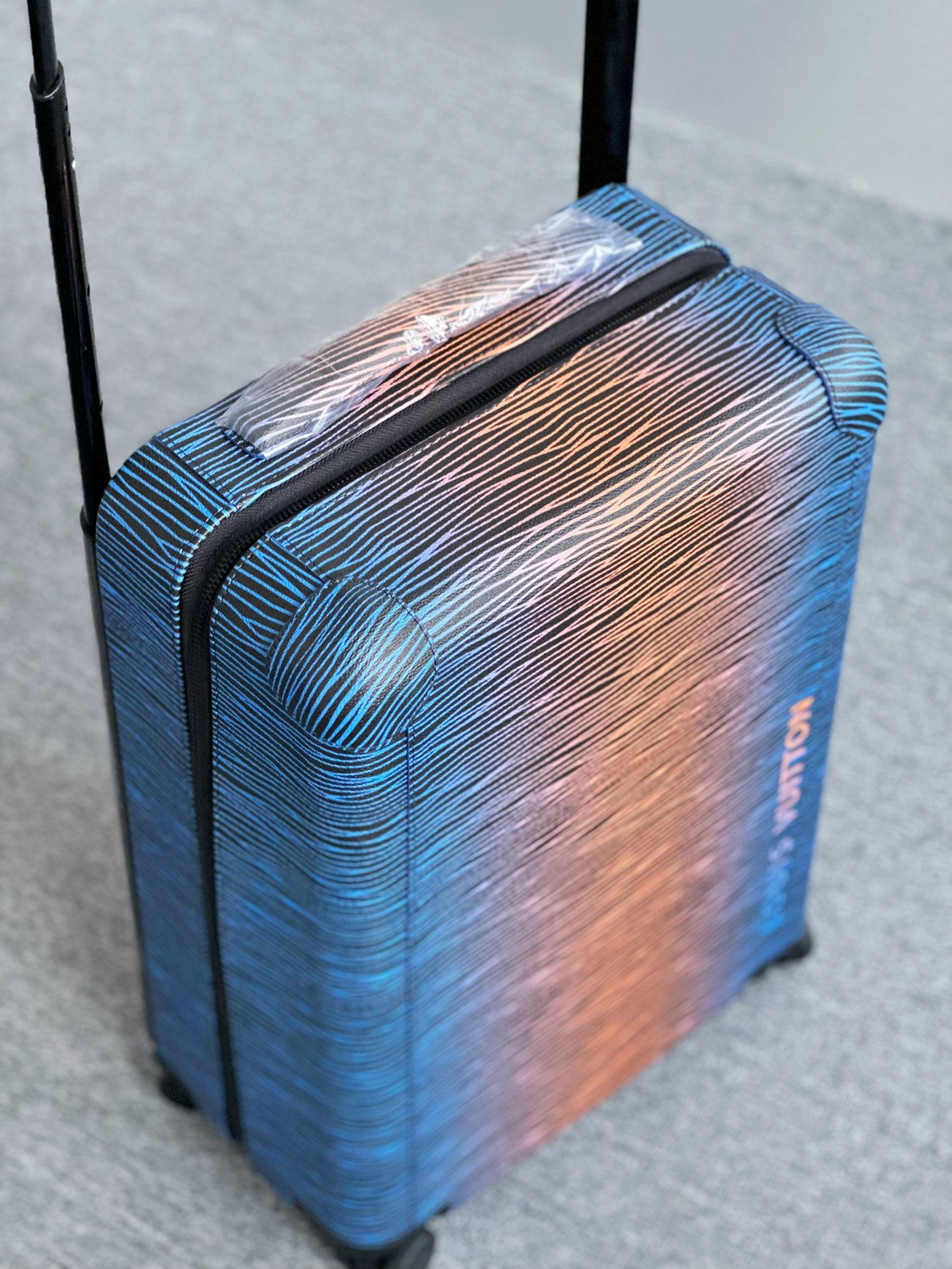 Gradient Blue and Orange Textured Hardshell Carry-On Spinner Luggage