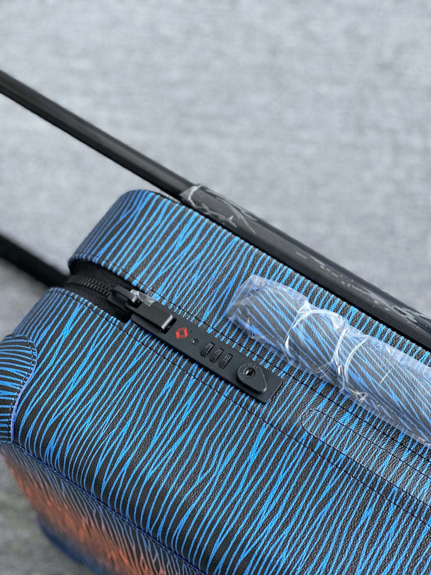 Gradient Blue and Orange Textured Hardshell Carry-On Spinner Luggage