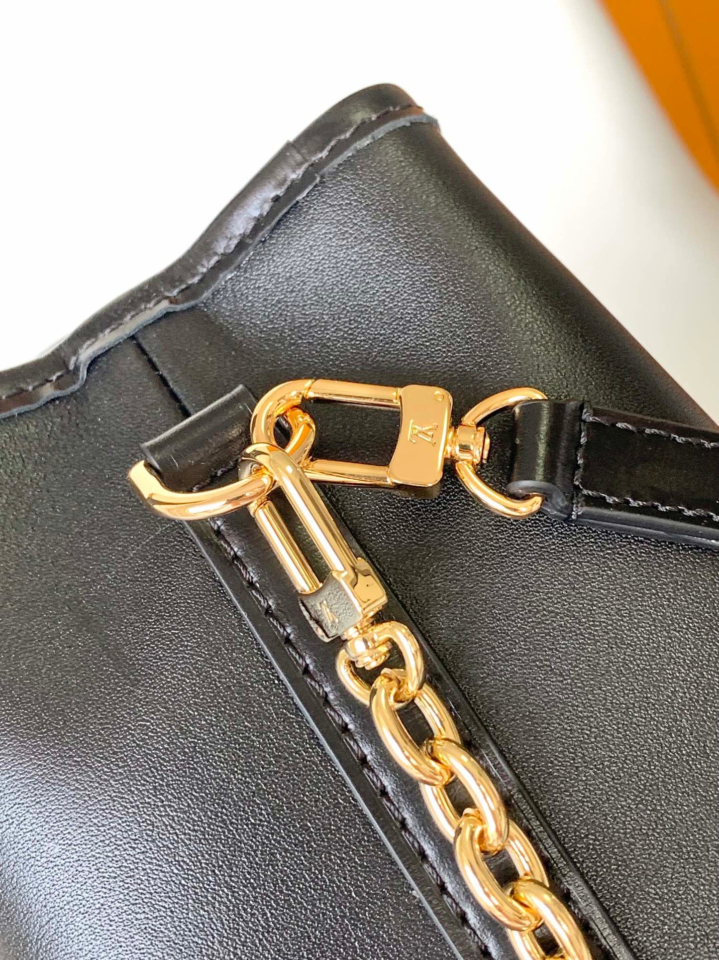 Louis Vuitton Luxury Black Leather Bucket Crossbody Bag with Gold Hardware