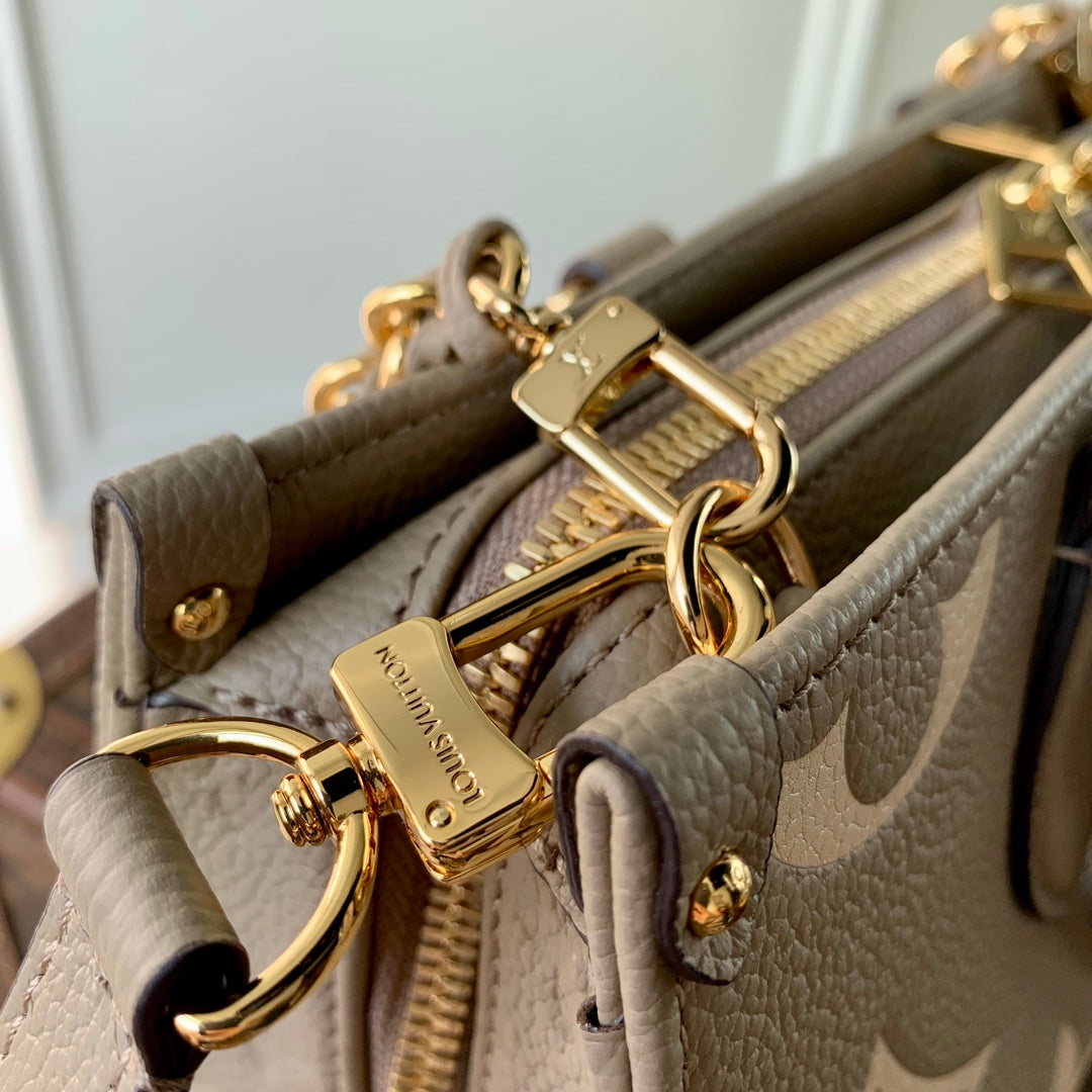 Louis Vuitton Taupe Embossed Leather Top Handle Handbag with Gold Chain Strap