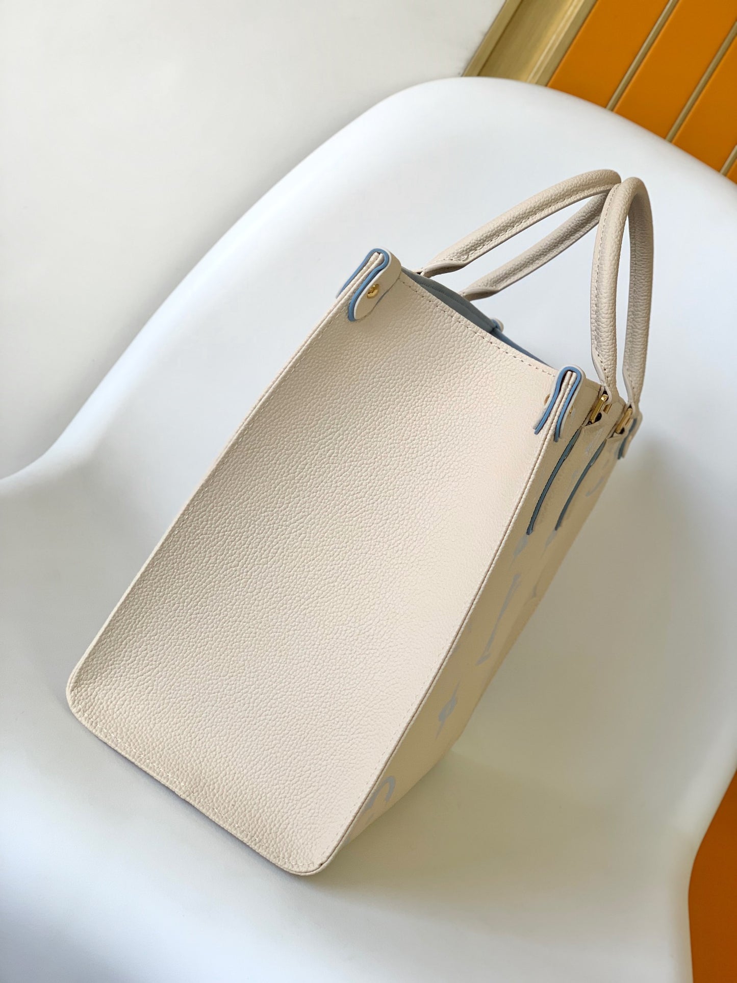 Louis Vuitton Elegant Beige and Pastel Blue Monogram Pattern Top Handle Tote Bag