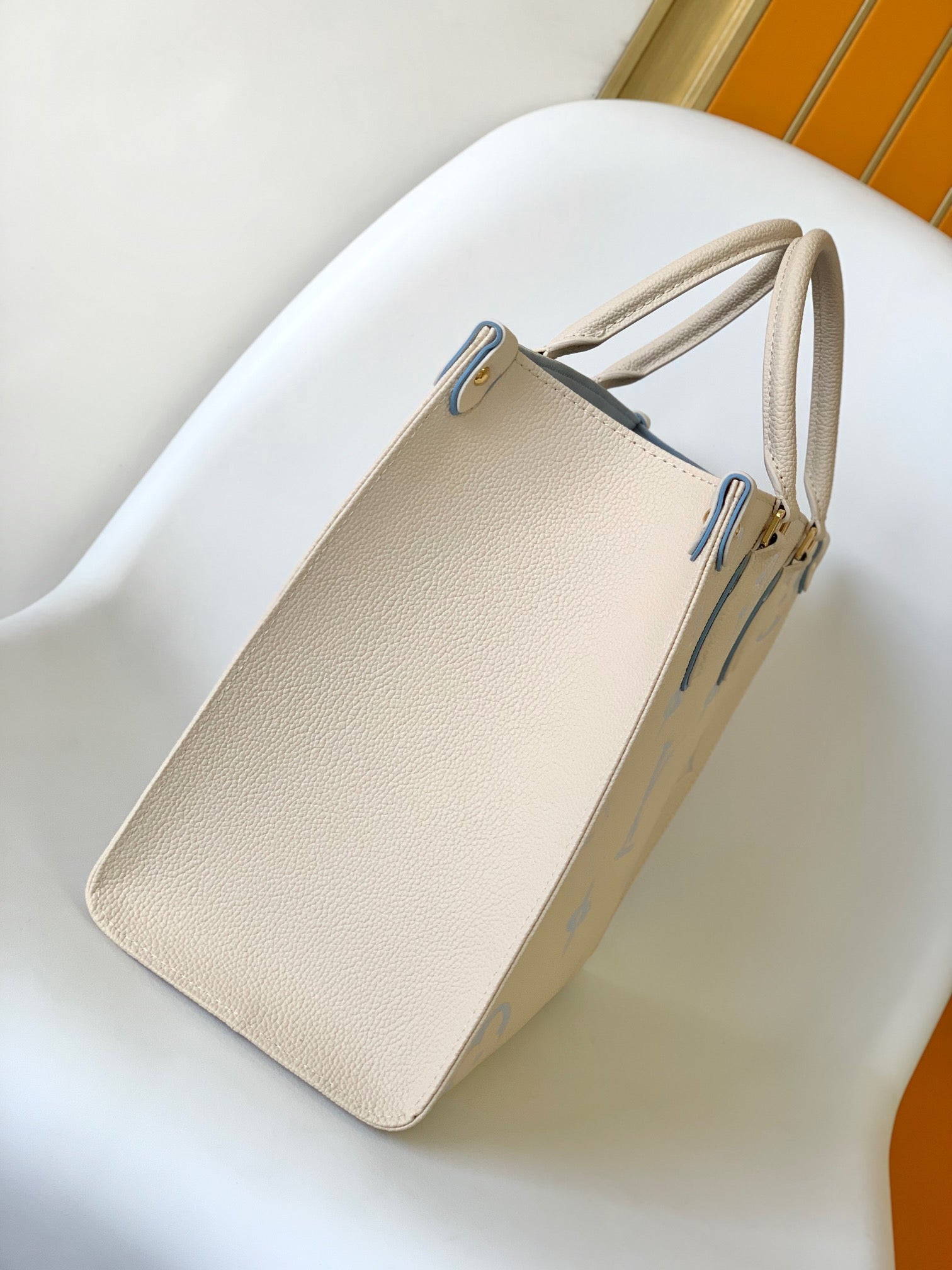 Louis Vuitton Elegant Beige and Pastel Blue Monogram Pattern Top Handle Tote Bag