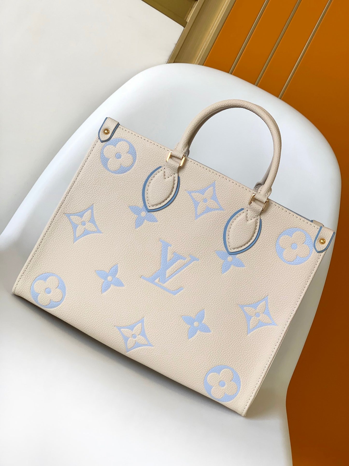 Louis Vuitton Elegant Beige and Pastel Blue Monogram Pattern Top Handle Tote Bag
