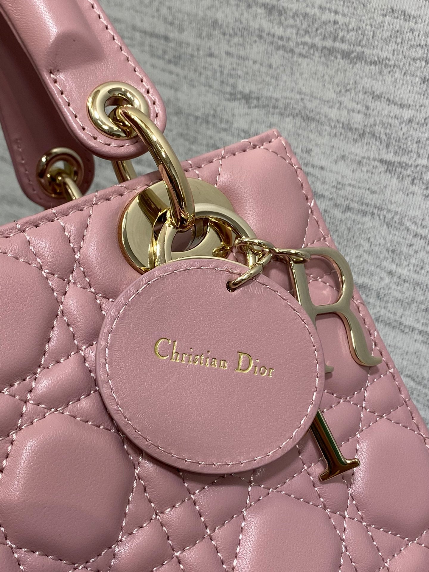 Dior Elegant Pink Quilted Leather Top Handle Bag with Shoulder Strap