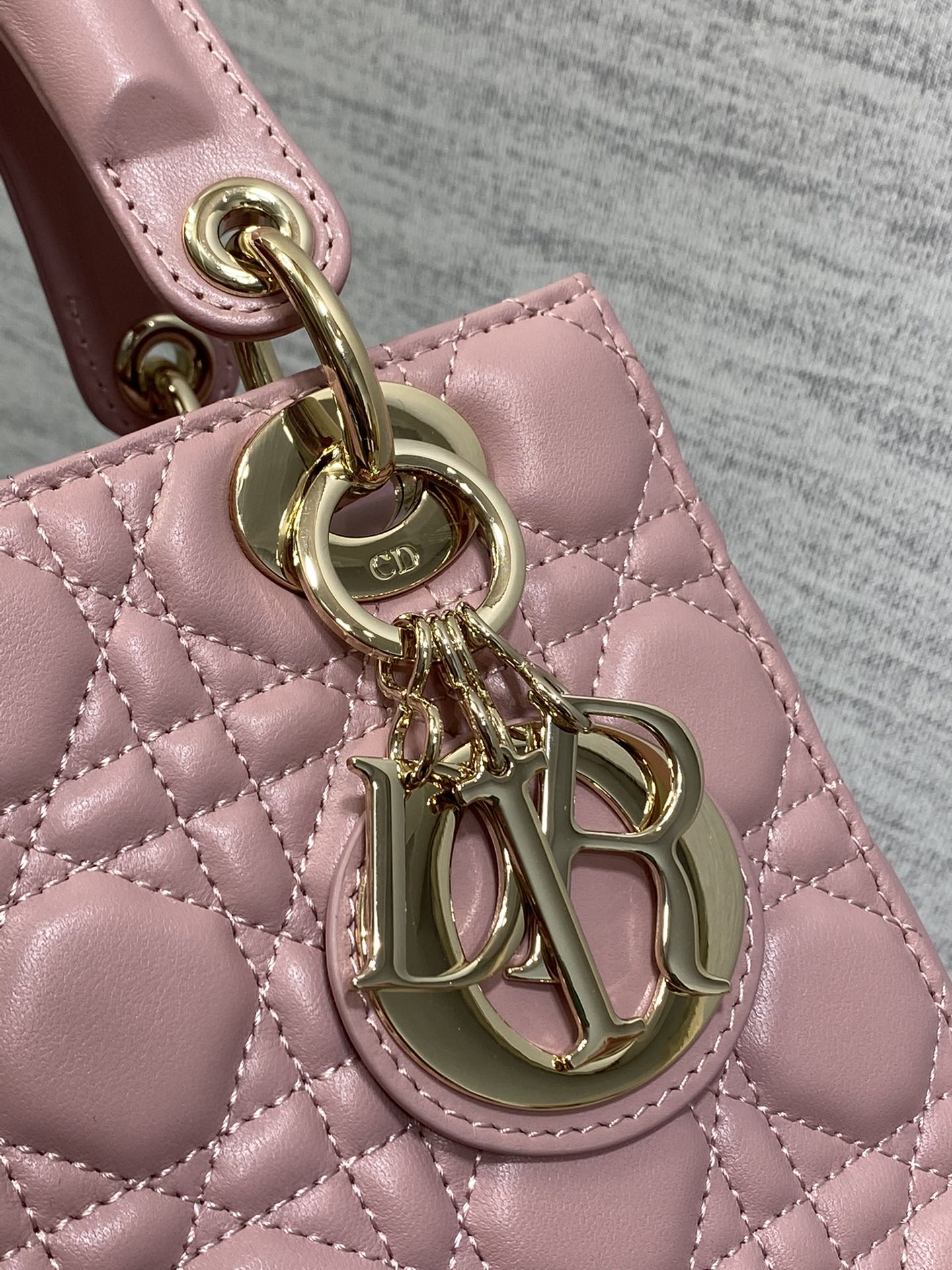 Dior Elegant Pink Quilted Leather Top Handle Bag with Shoulder Strap