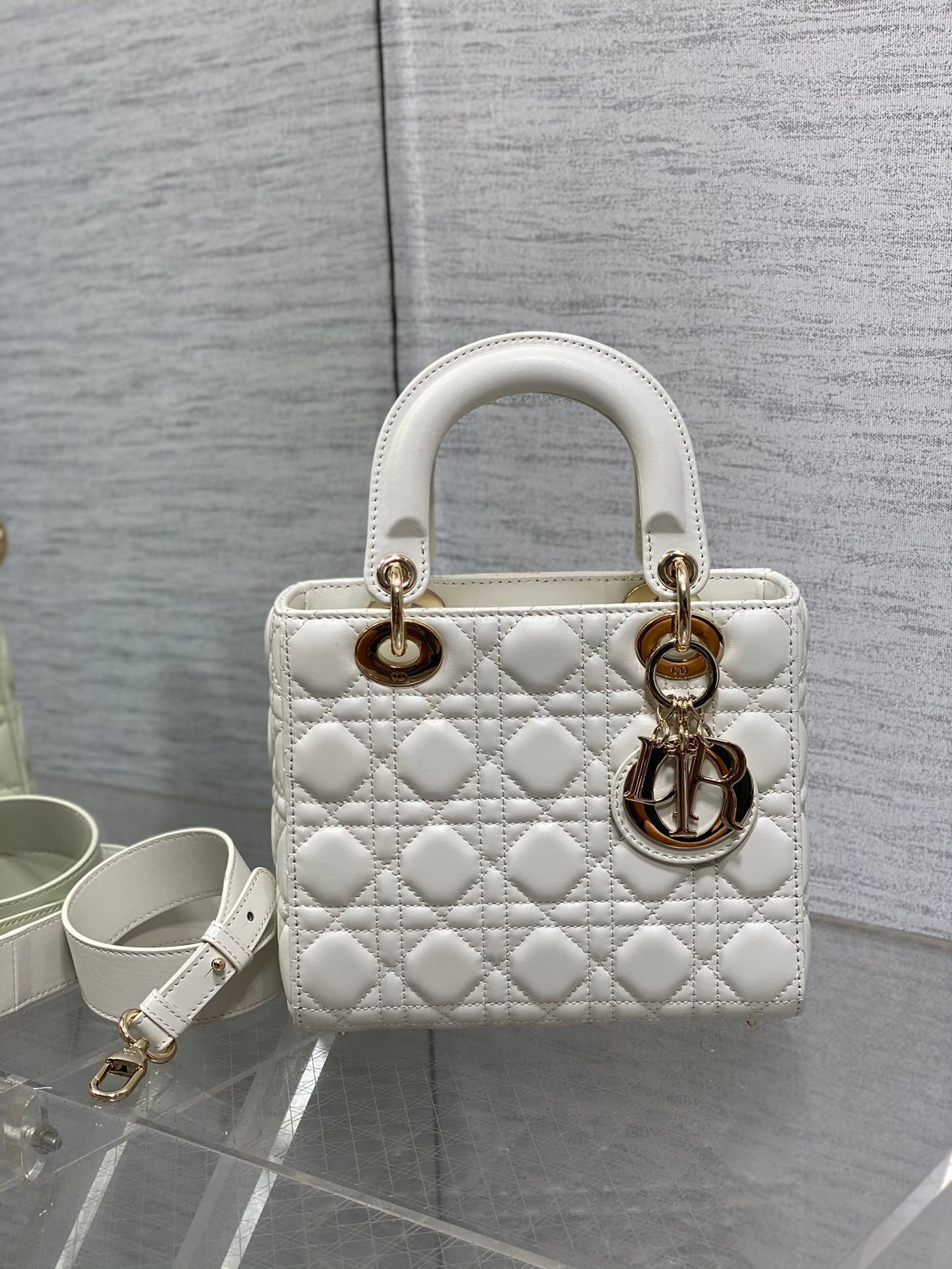 Dior White Quilted Leather Handbag with Gold Charms and Wide Strap